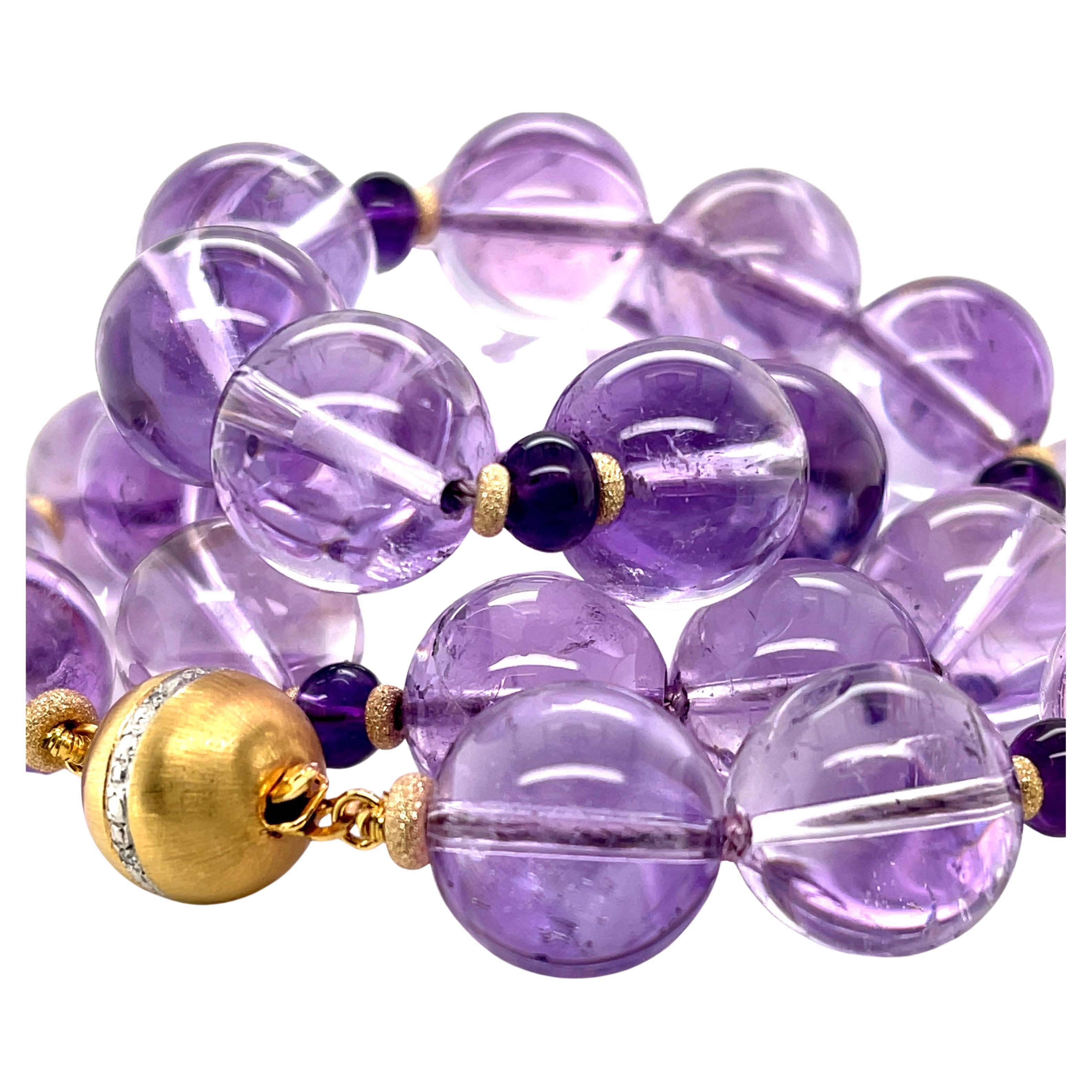 This gorgeous strand of beautifully matched Rose de France amethyst beads is sure to make you smile! Rose de France amethyst is known for its lovely pastel purple color, and these impressive 14mm round beads are simply stunning! Amethyst has been
