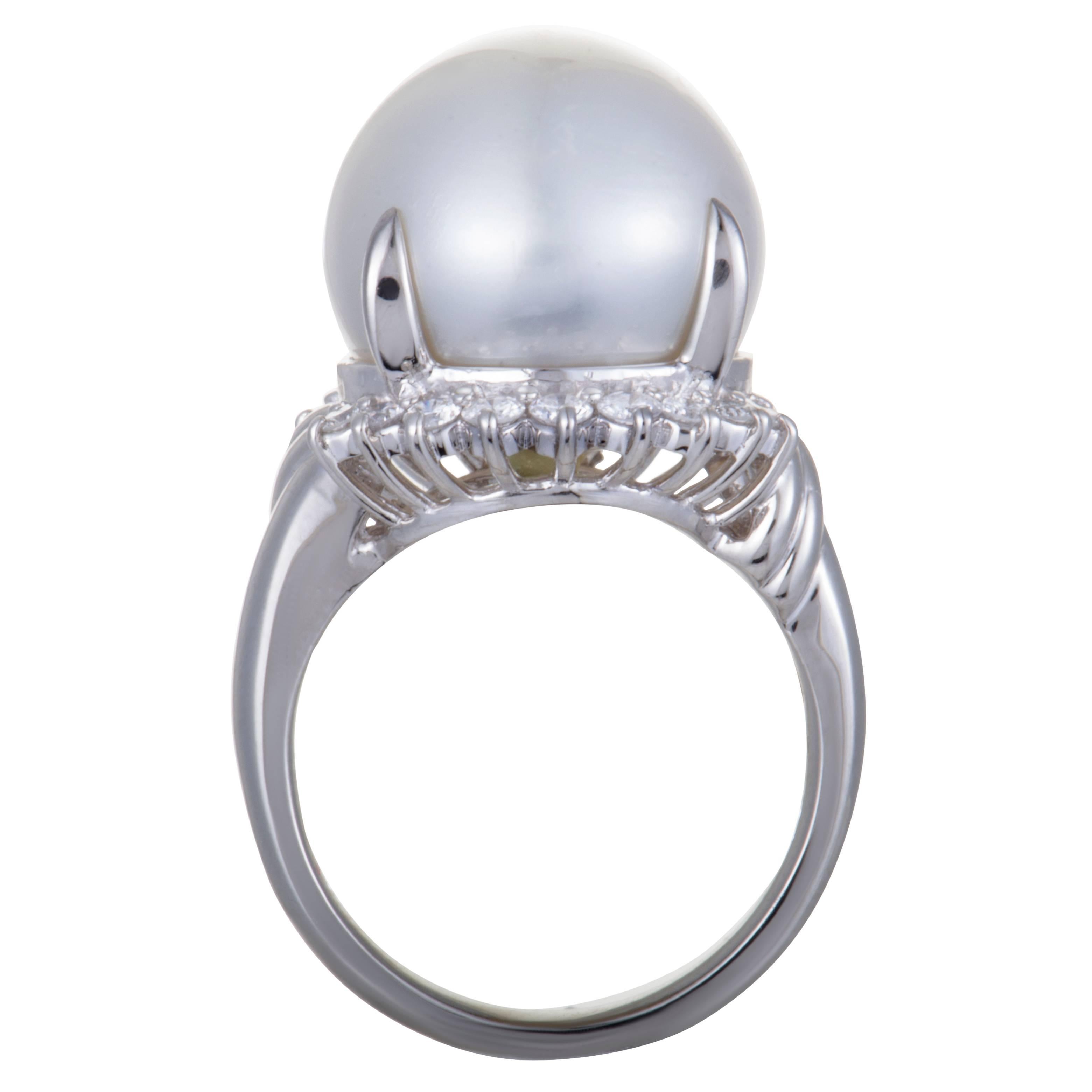 Beautifully crafted in shimmering platinum, this gorgeous ring is a beauty. The exemplary ring is embellished in 0.50ct of dazzling diamonds and and elegant white pearl of 12mm that make the piece absolutely exquisite.
Ring Size: 6.5
Ring Top
