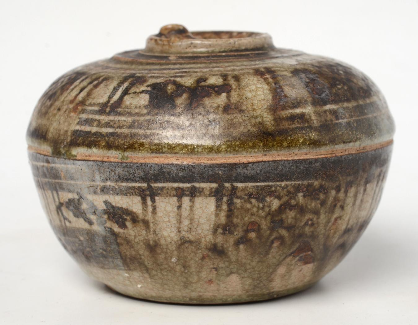 Antique Sukhothai ceramic covered bowl in fruit shape.

Age: Thailand, Sukhothai Period, 14th - 16th Century
Size: Height 7.6 C.M. / Width 11.3 C.M.
Condition: Nice glaze and condition overall, the cover is stuck with body (cannot open) due to long