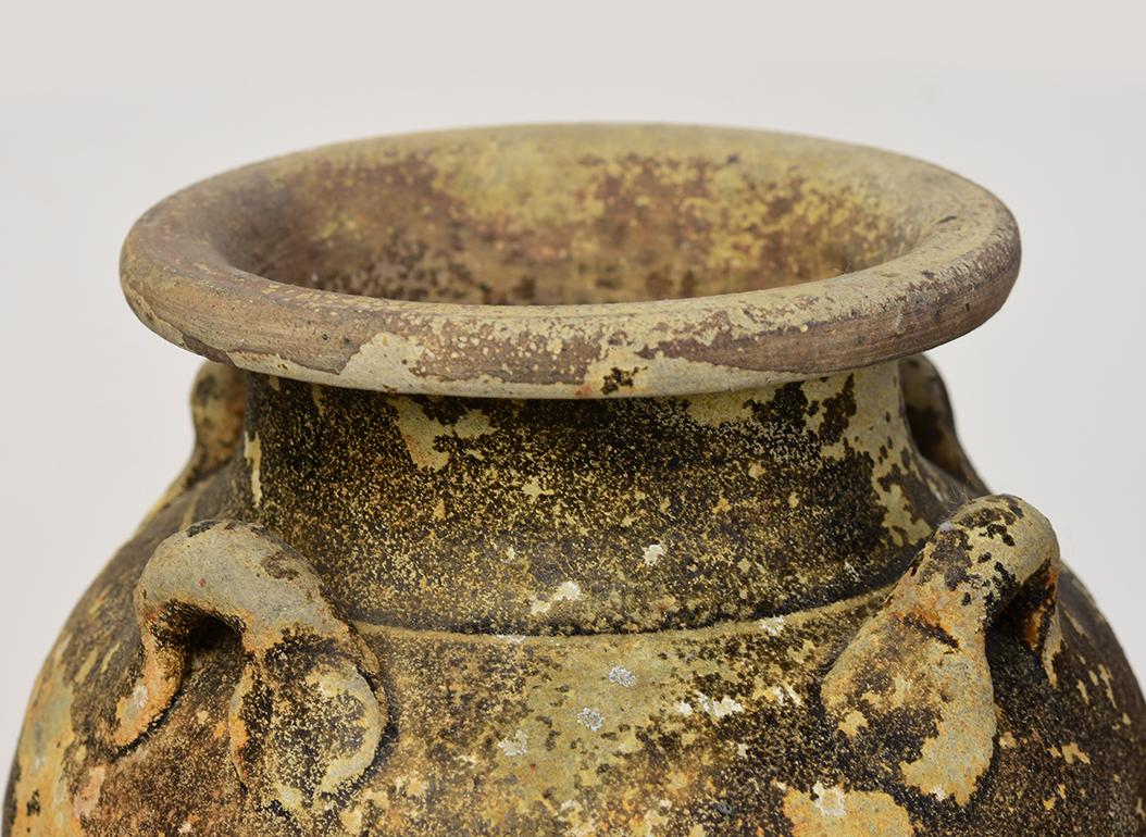 A pair of Sukhothai pottery jars.

Age: Thailand, Sukhothai Period, 14th - 16th Century
Size: Height 29 - 29.3 C.M. / Width 17 - 17.5 C.M.
Condition: Nice condition overall (some expected degradation due to their age).

100% Satisfaction and