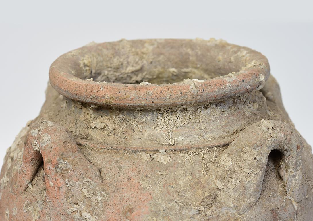 Sukhothai pottery jar from shipwreck.

Age: Thailand, Sukhothai Period, 14th - 16th Century
Size: Height 27 C.M. / Width 21 C.M.
Condition: Nice condition overall (some expected degradation due to its age).

100% Satisfaction and authenticity