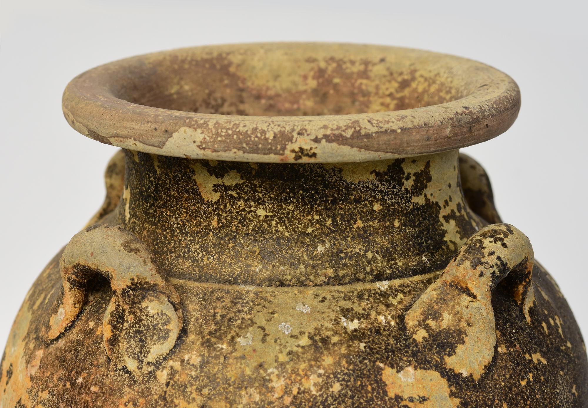 Antique Thai Sukhothai pottery jar.

Age: Thailand, Sukhothai Period, 14th - 16th Century
Size: Height 29.7 C.M. / Width 17.3 C.M.
Condition: Nice condition overall (some expected degradation due to its age).

100% Satisfaction and authenticity