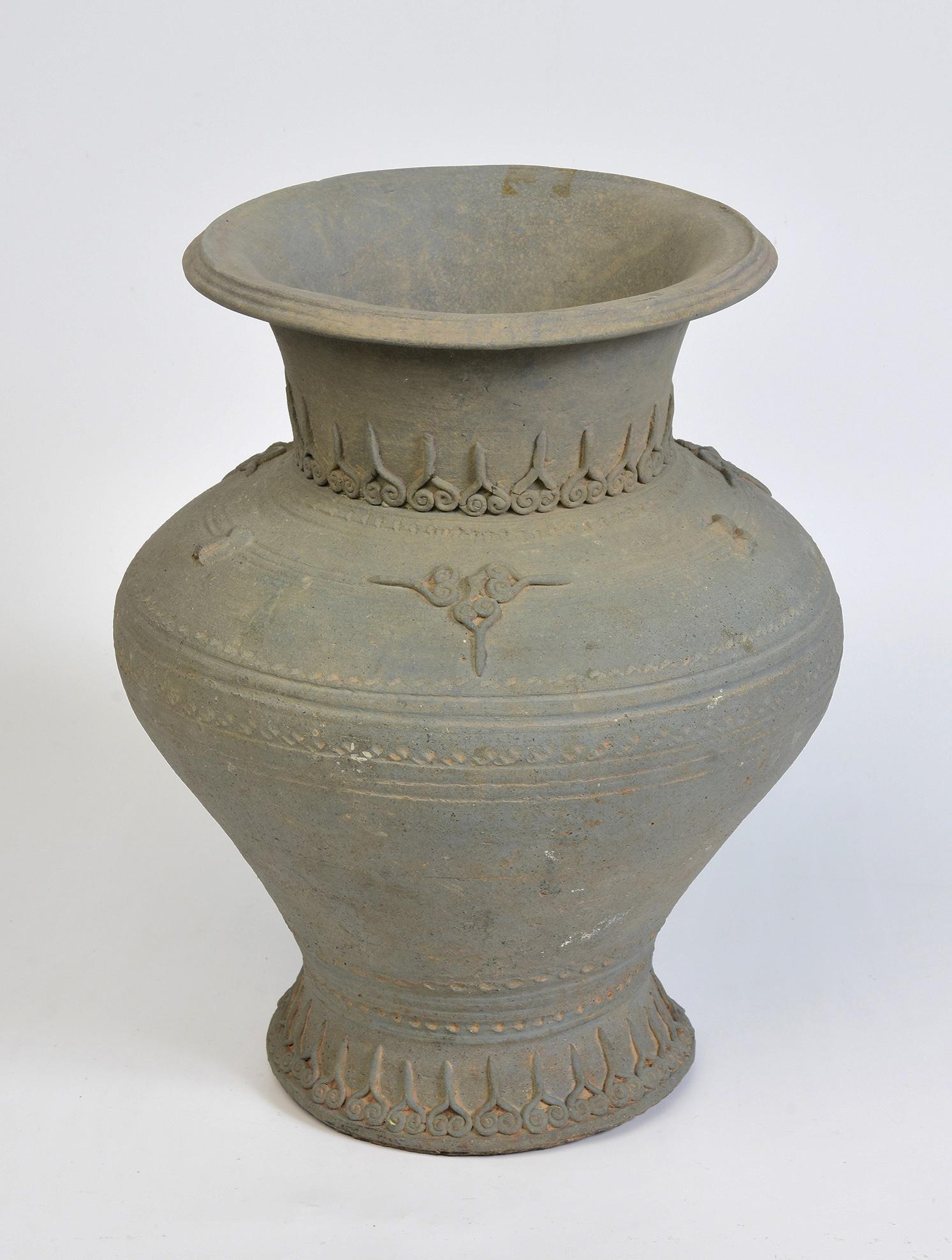 Antique Thai Sukhothai stoneware pottery jar.

Age: Thailand, Sukhothai Period, Si Satchanalai Kiln, 14th - 16th Century
Size: Height 31.7 C.M. / Width 26 C.M.
Condition: Nice condition overall (some expected degradation due to its age).

100%