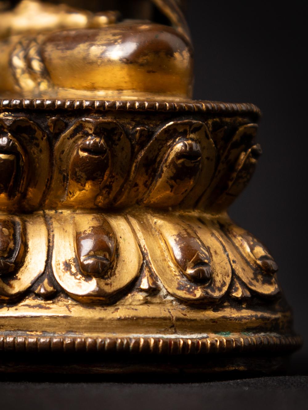 14th century Tibetan gilt and lacquered Śākyamuni Buddha in Bhumisparsha Mudra For Sale 9