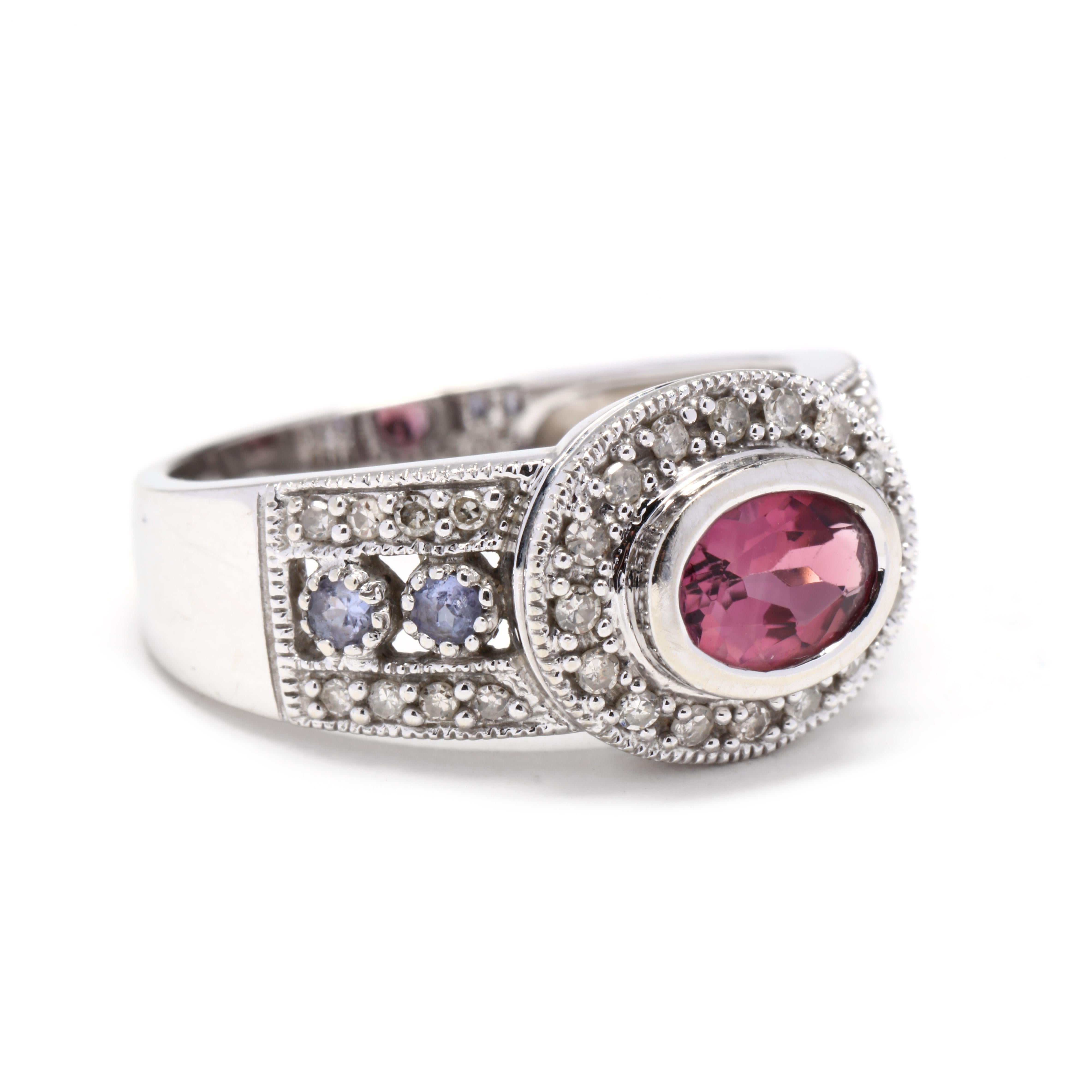 A 14 karat white gold pink tourmaline, amethyst and diamond band ring. This ring features a horizontal bezel set, oval cut pink tourmaline weighing approximately 1.20 carats surrounded by a halo of single cut round diamonds with a three row band set