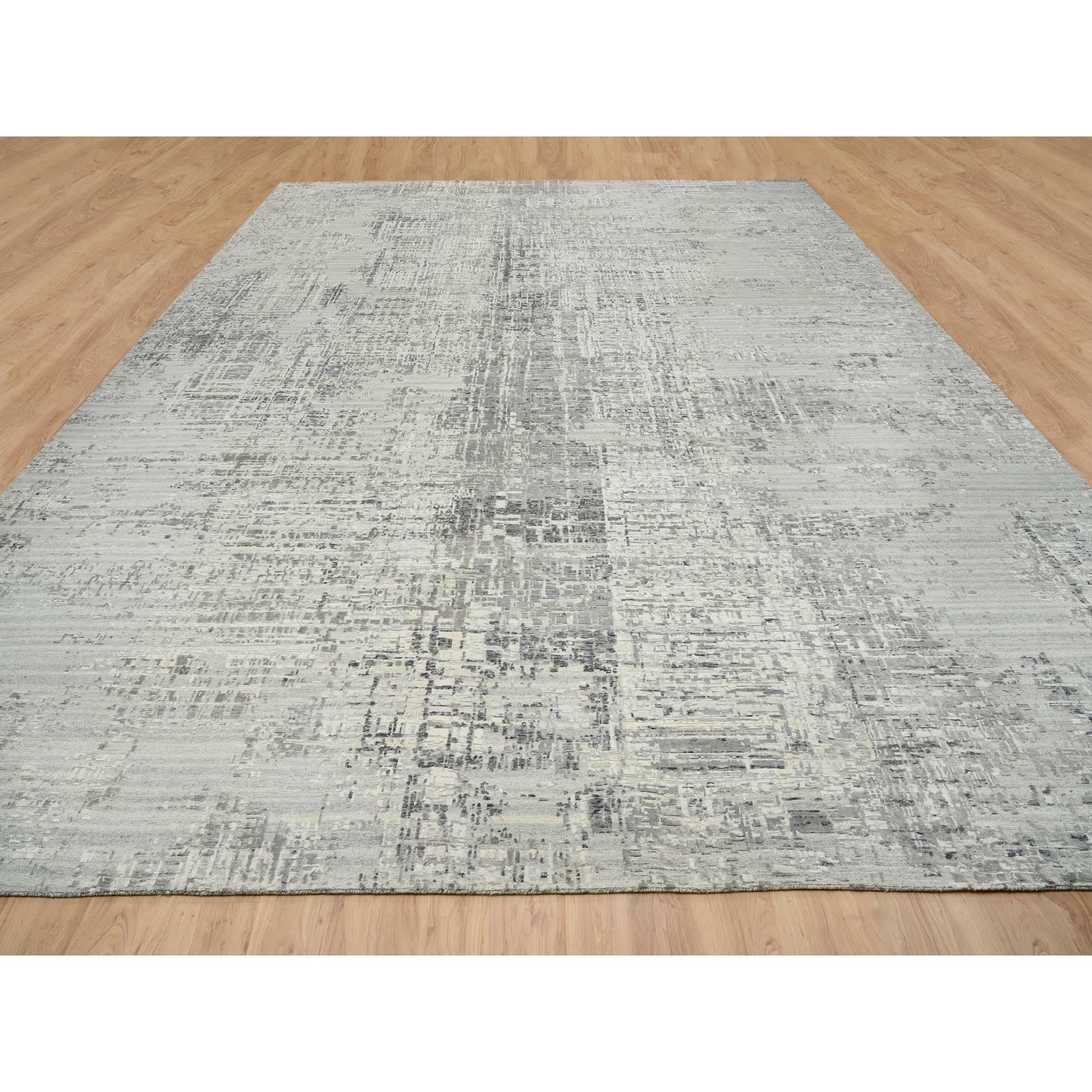 Light Gray, Hand Knotted, Modern Design, Hand Spun Undyed Natural Wool, Oriental Rug
Primary materials: Wool
Latex: No Pile 
height: 0.25 Inches
Style: Casual
Primary color: Grey
Secondary colors: Silver, Ivory, Black
Pattern: Oriental