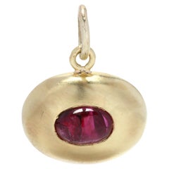 14Y Horizontal Oval Cabochon Ruby Charm