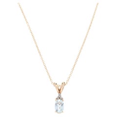 14Y Oval Aquamarine & Diamond Pendant Necklace