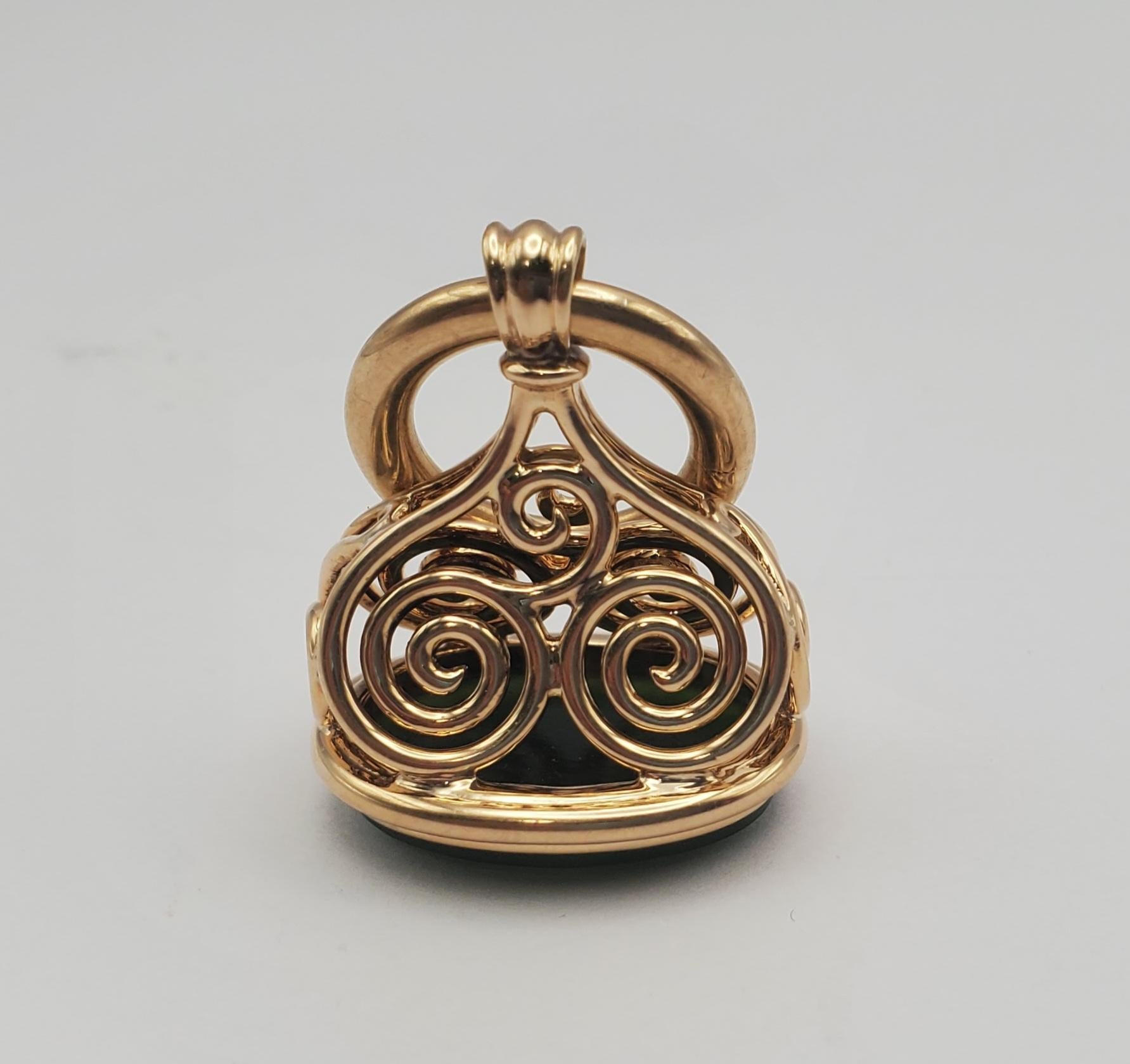 Unique Victorian fob pendant crafted in 14k yellow gold and bezel set with a nephrite jade cabochon. Fobs were often worn at the end of pocket watch chains or on lapel pins in Victorian times. Today they are primarily worn on chains as necklace