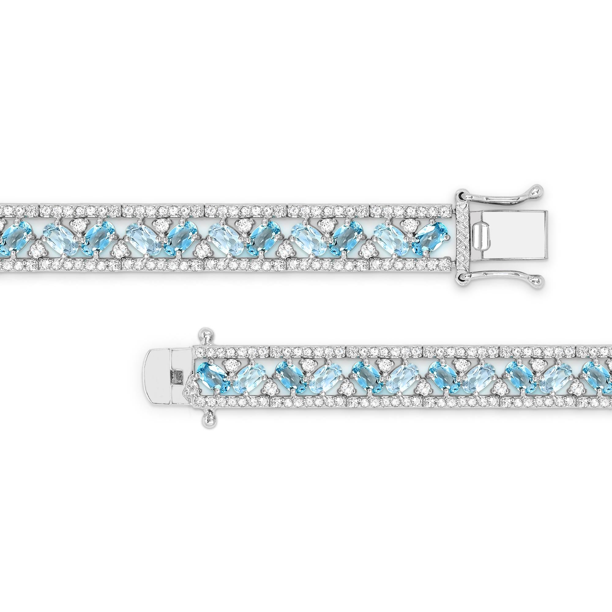 Contemporary 15-1/8 Carat Oval Blue Hues Topaz and White Topaz Accent Bracelet