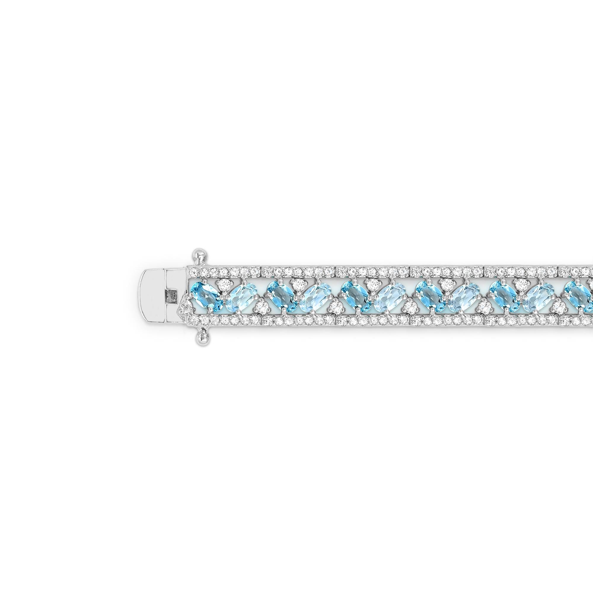 15-1/8 Carat Oval Blue Hues Topaz and White Topaz Accent Bracelet In New Condition In New York, NY