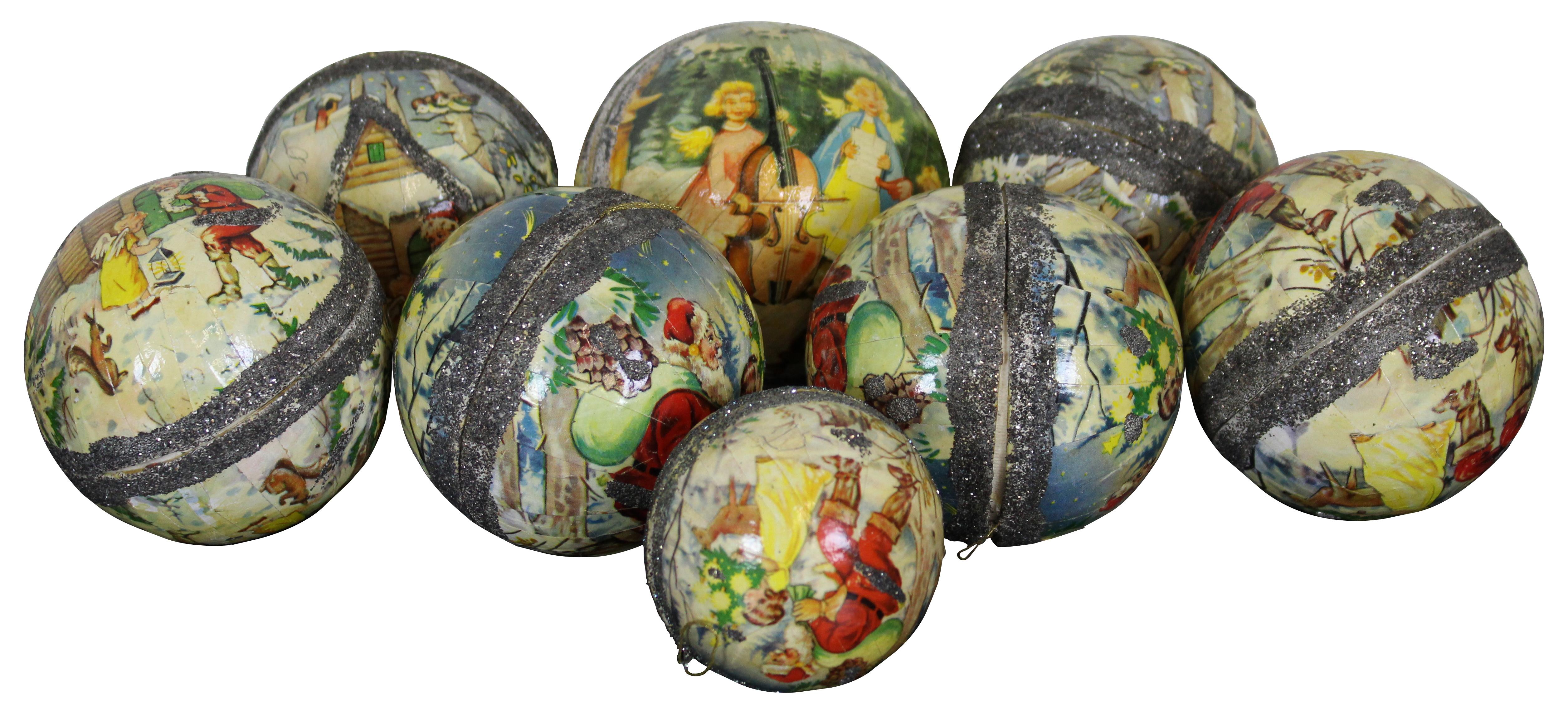 Lot of fifteen vintage West German paper mache Christmas ornament ball candy containers, eight featuring three different lithograph scenes of Santa Claus, children and angels; the remaining seven are painted in solid colors accented with silver