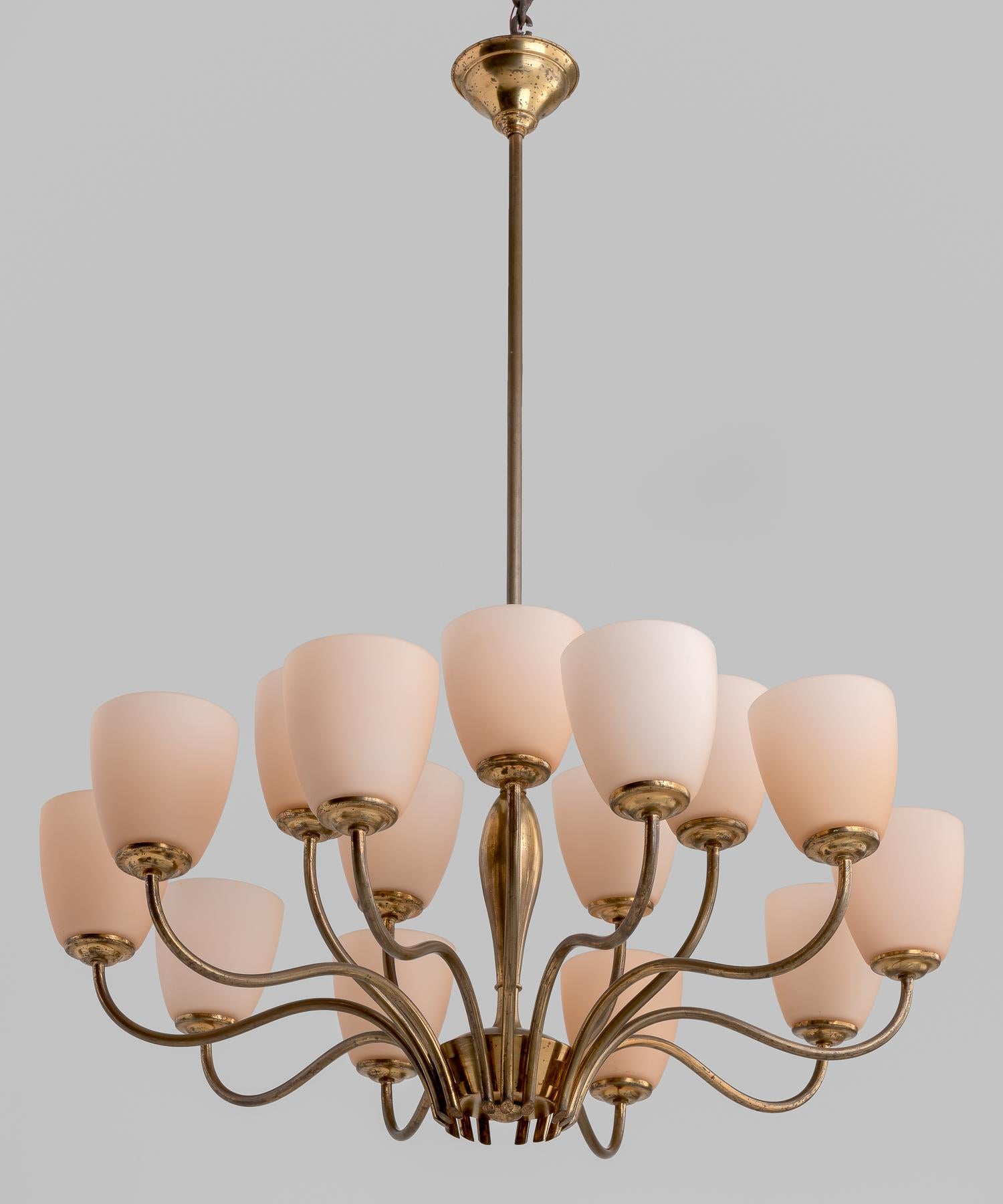 15-Arm Brass Chandelier, Italy, circa 1950

15 open-top glass shades on curved brass arms.

32