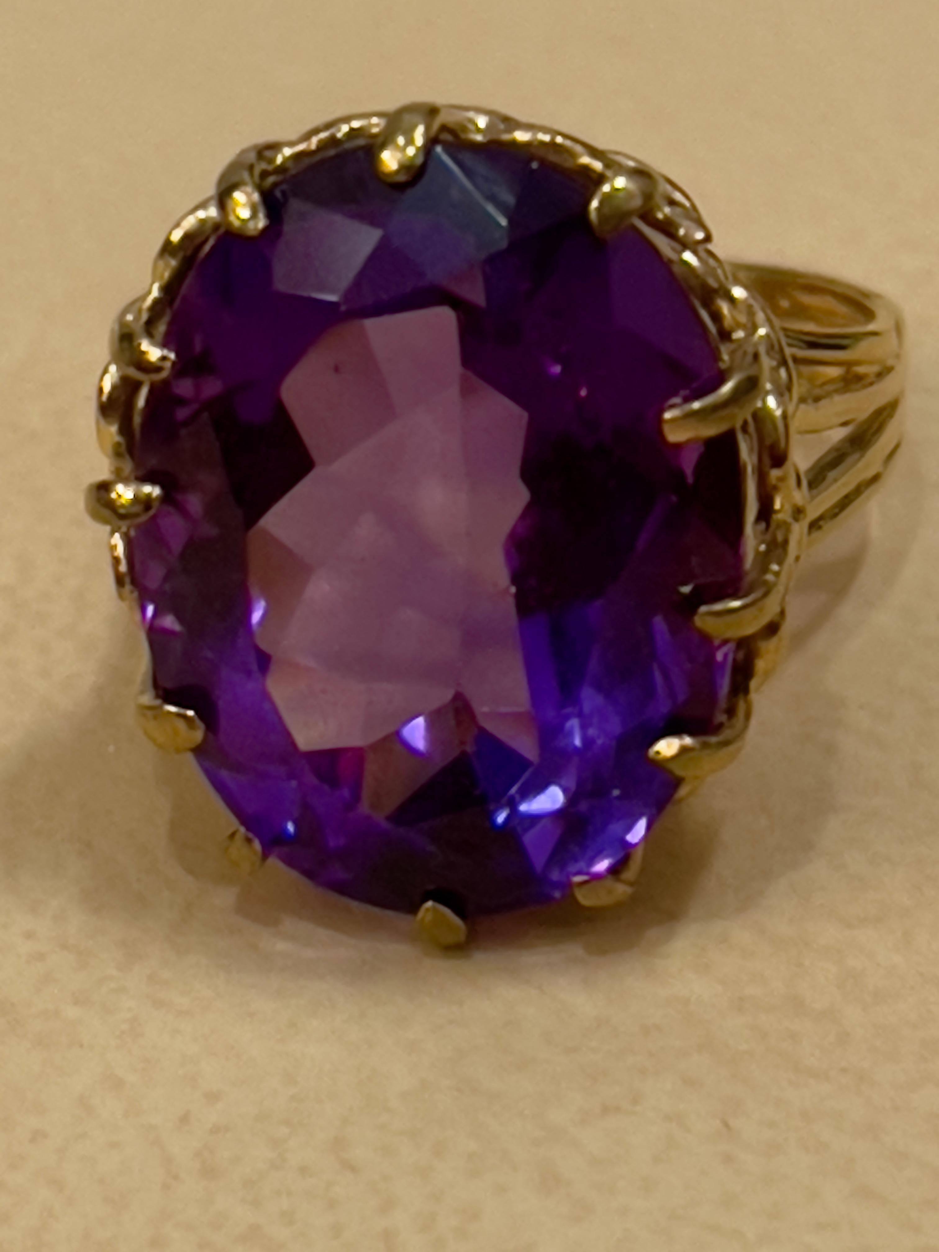 Approximately 15 Carat Beautiful  Amethyst Cocktail Ring in 14 Karat Yellow Gold Size 4.5
This is a Beautiful Cocktail ring ring which has a large approximately 15  carat of high quality Amethyst . Color and clarity is extremely nice. Large Oval cut