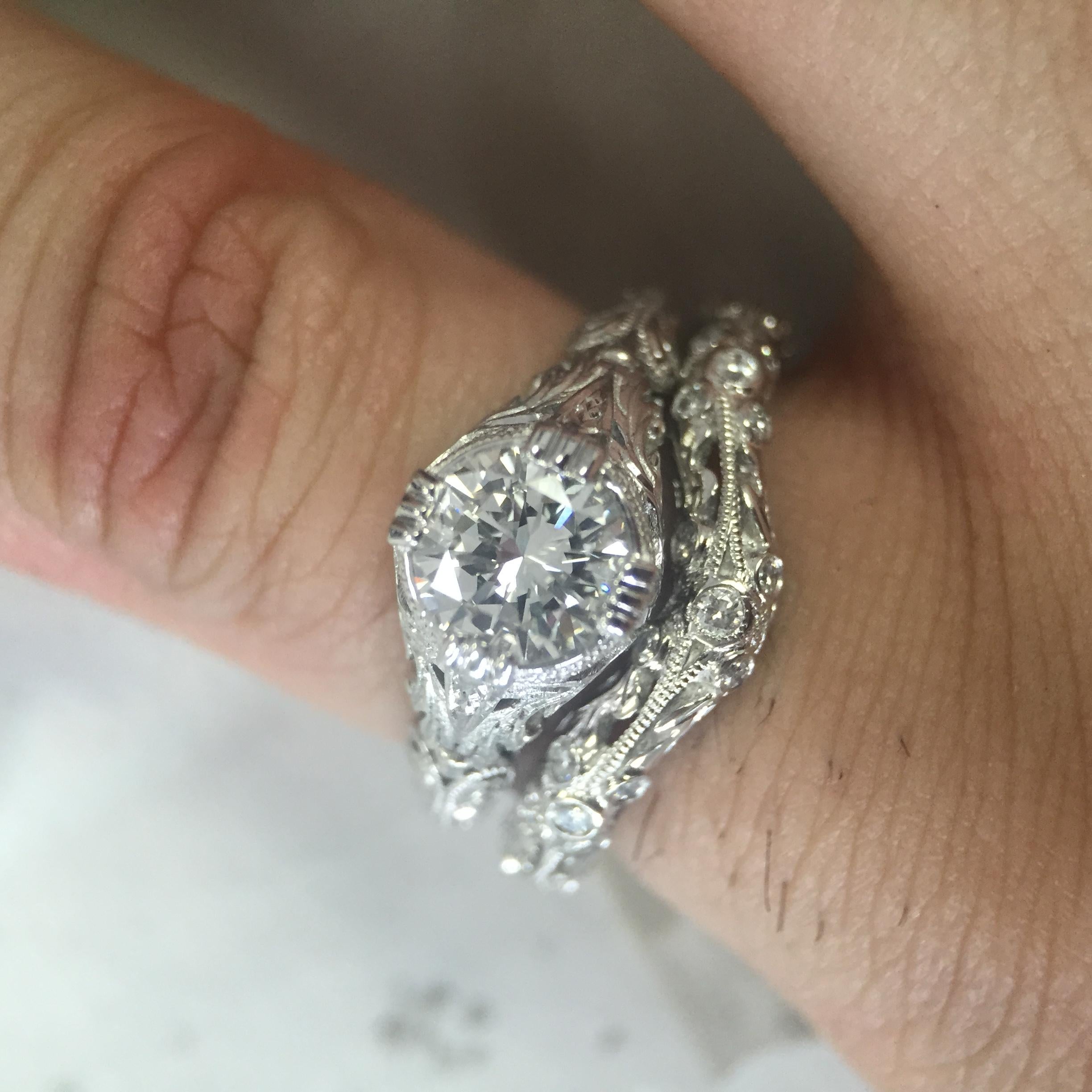 1.5 carat diamond ring on hand