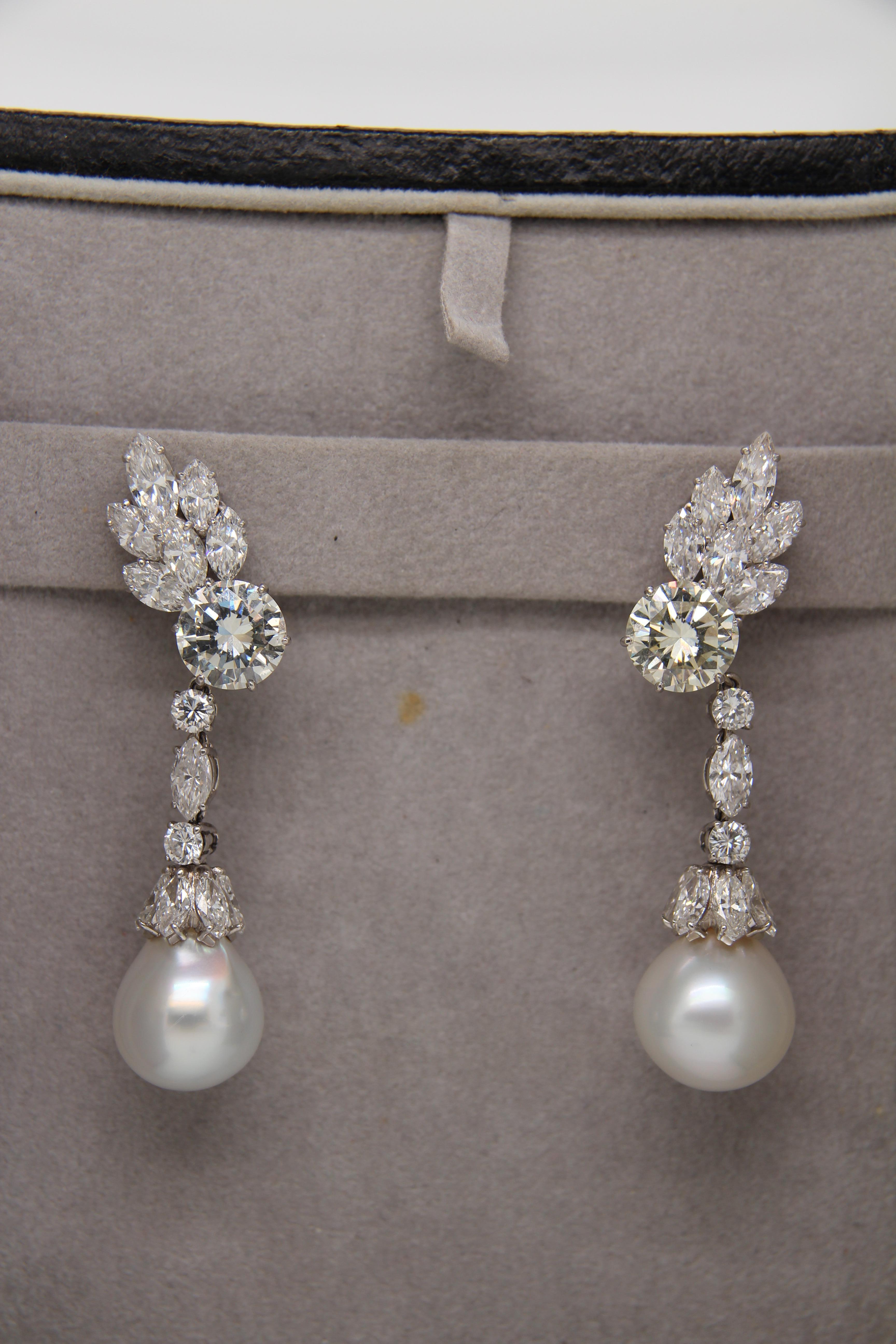 BVLGARI Pearl Earrings. Pearl pair weighing 40.00 carat approximately and diamonds weighing 15.00 carat approximately. The earring is made in 18 karat white gold 24.45 g gross weight