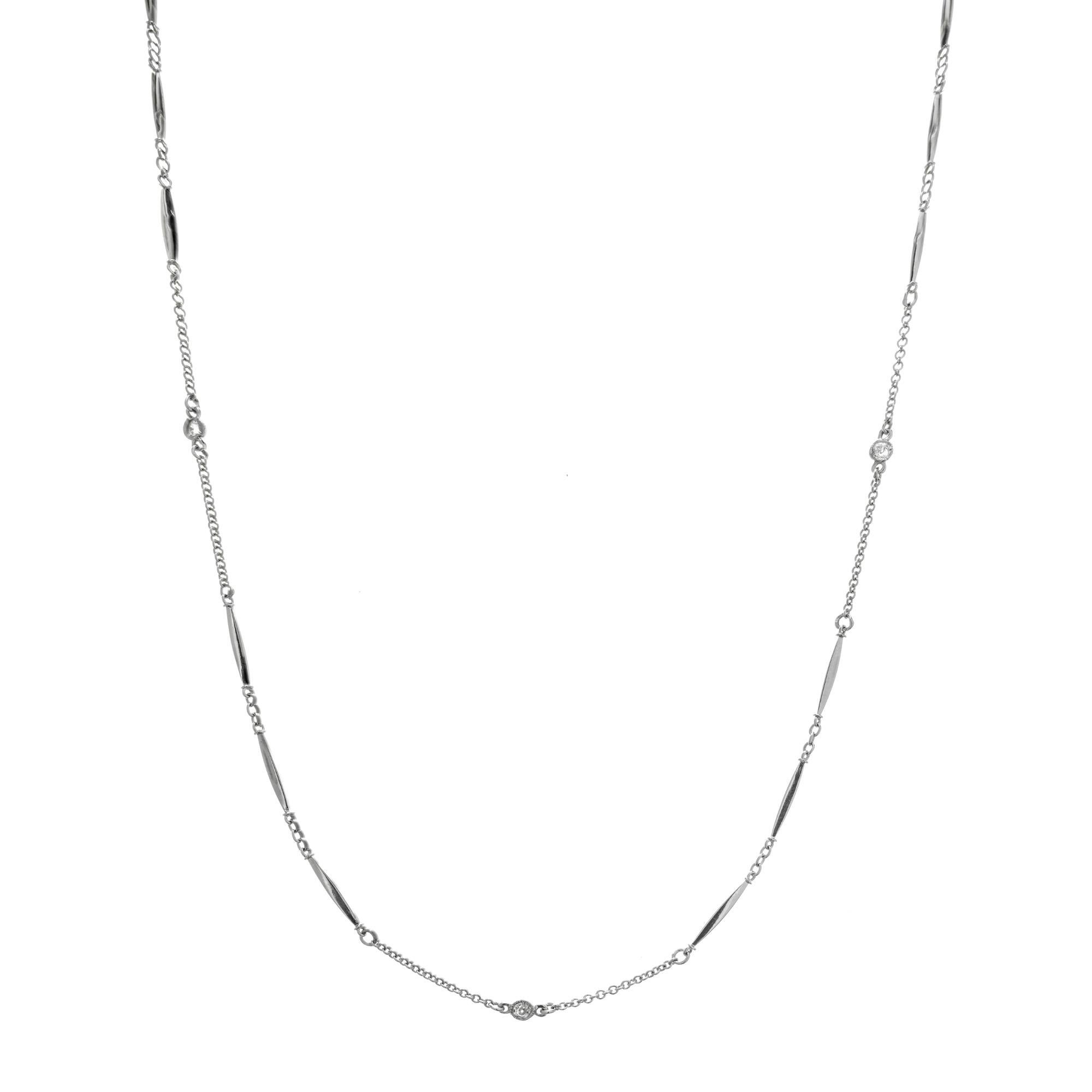 Unqiue Diamond link by the yard 20 inch Platinum bar link chain, circa 1930-1940. 
  
5 old mine brilliant cut diamonds, H SI approx. .15cts  SI    
Platinum
Tested: Platinum    
8.3 grams
Tubes: 3mm    
Chain: 1.2mm
Bars: 1.5mm wide   
Length: 20