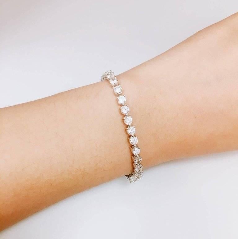 This is a lovely hand made three prong bracelet by Emilio! We can make this bracelet shorter or longer, the one pictured is 7 inches long. 
7 inches long, and can be shortened or lengthed
Approx total weight: 38 round diamonds .15ct each and total