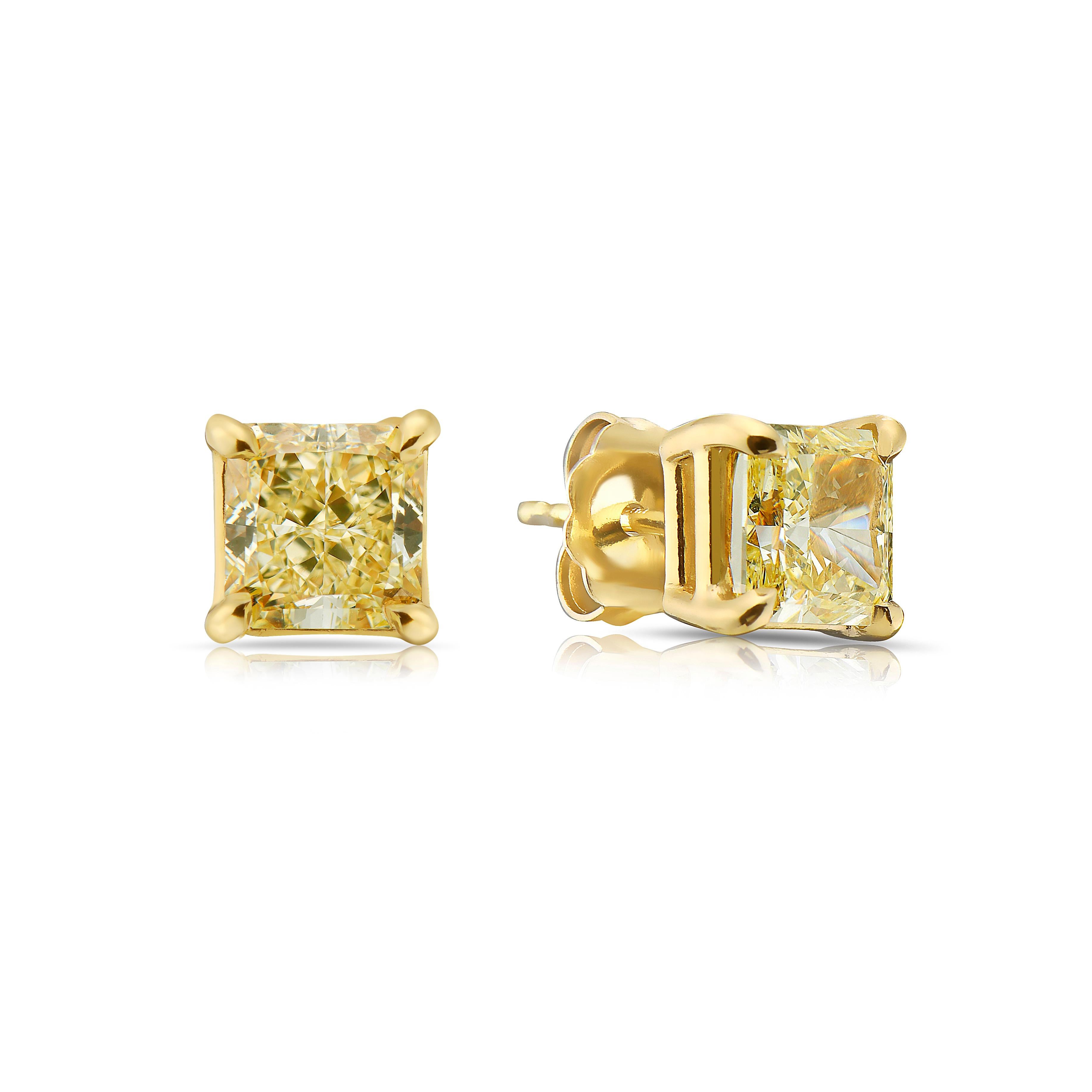 Add a touch of timeless elegance to your jewelry collection with these Fancy Yellow radiant cut diamond stud earrings, featuring 1.43ct and 1.57ct diamonds. GIA certified for their authenticity, these vibrant yellow diamonds boast exceptional