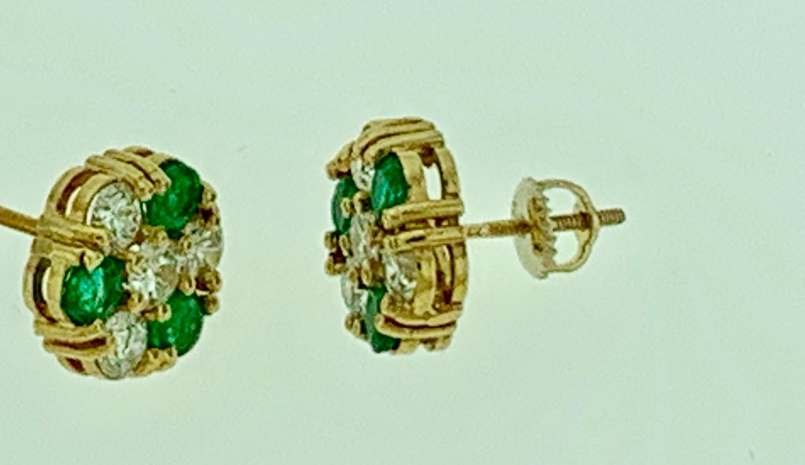 1.5 Carat Emerald and 2 Carat Diamonds Flower Post Earrings 14 Karat Yellow Gold In Excellent Condition In New York, NY