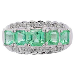 Anillo de 5 piedras con esmeralda y diamantes de 1,5 quilates en platino