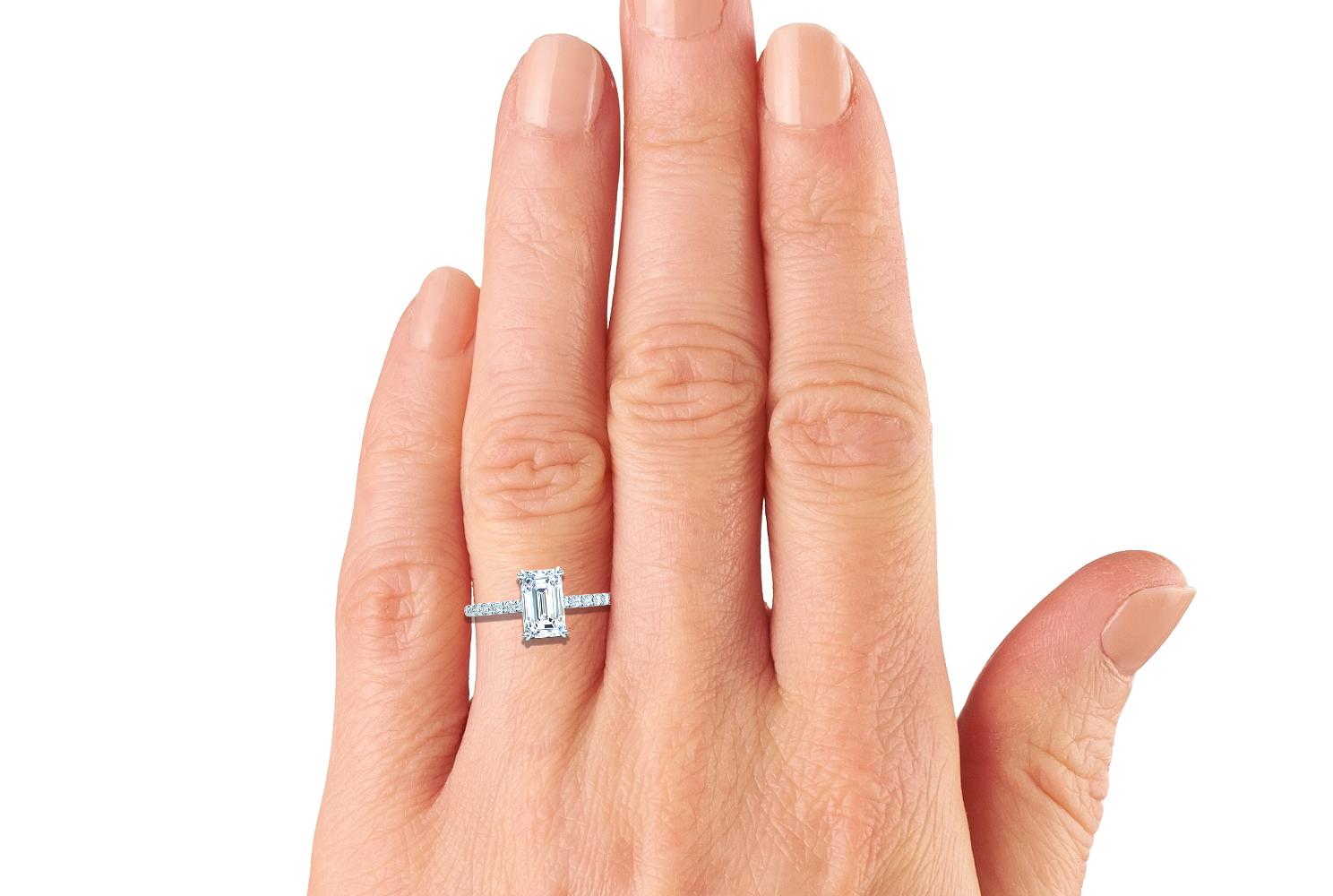 1.5 ct emerald cut diamond ring