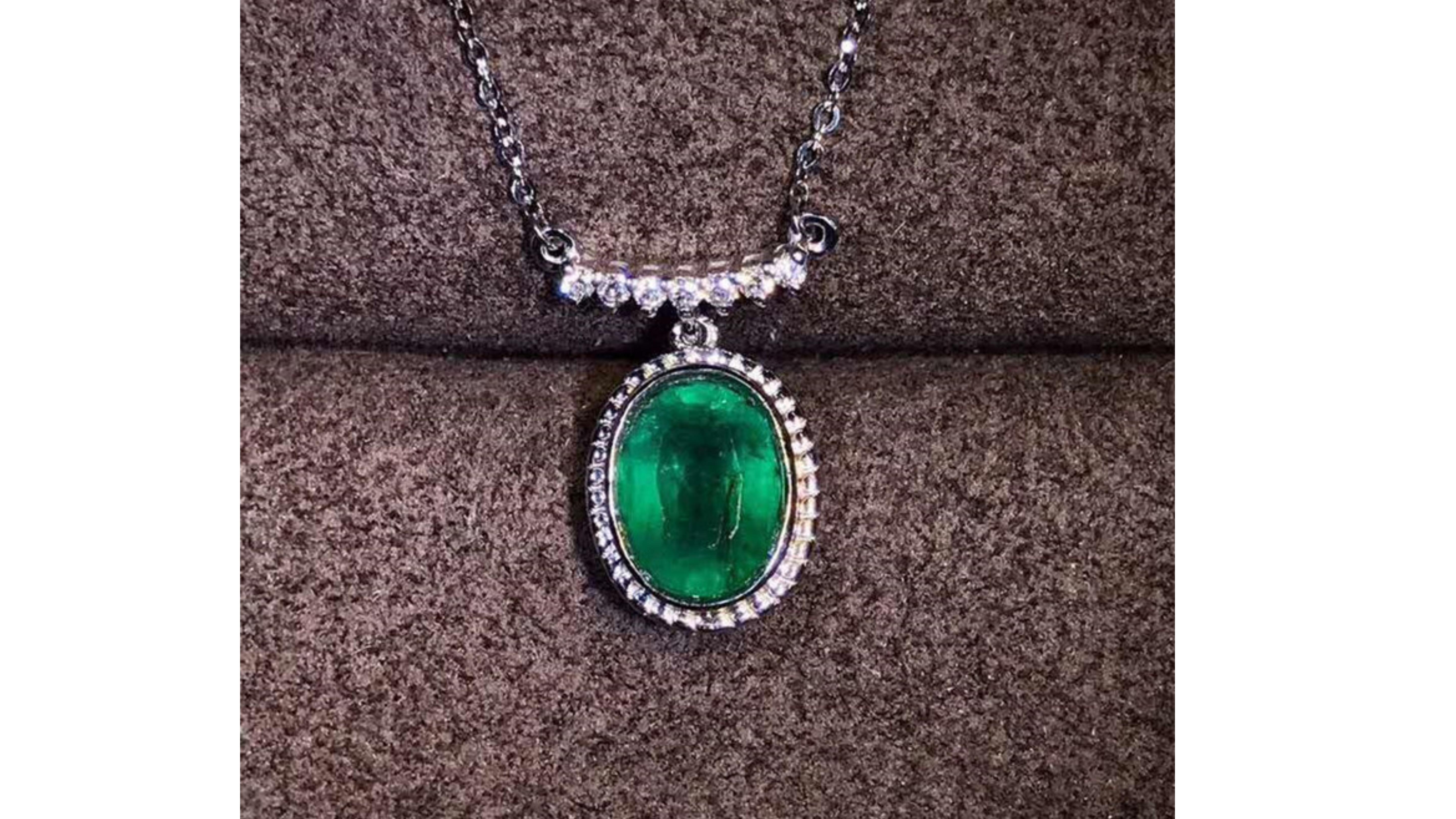 

1.5 Carat Emerald Necklace 18 Karat White Gold with 47 White Diamonds and also ones across pendant at top making it really stand out .  If you are looking for anything specific do let us know as we might have it.


1.5ct natural green emerald
main