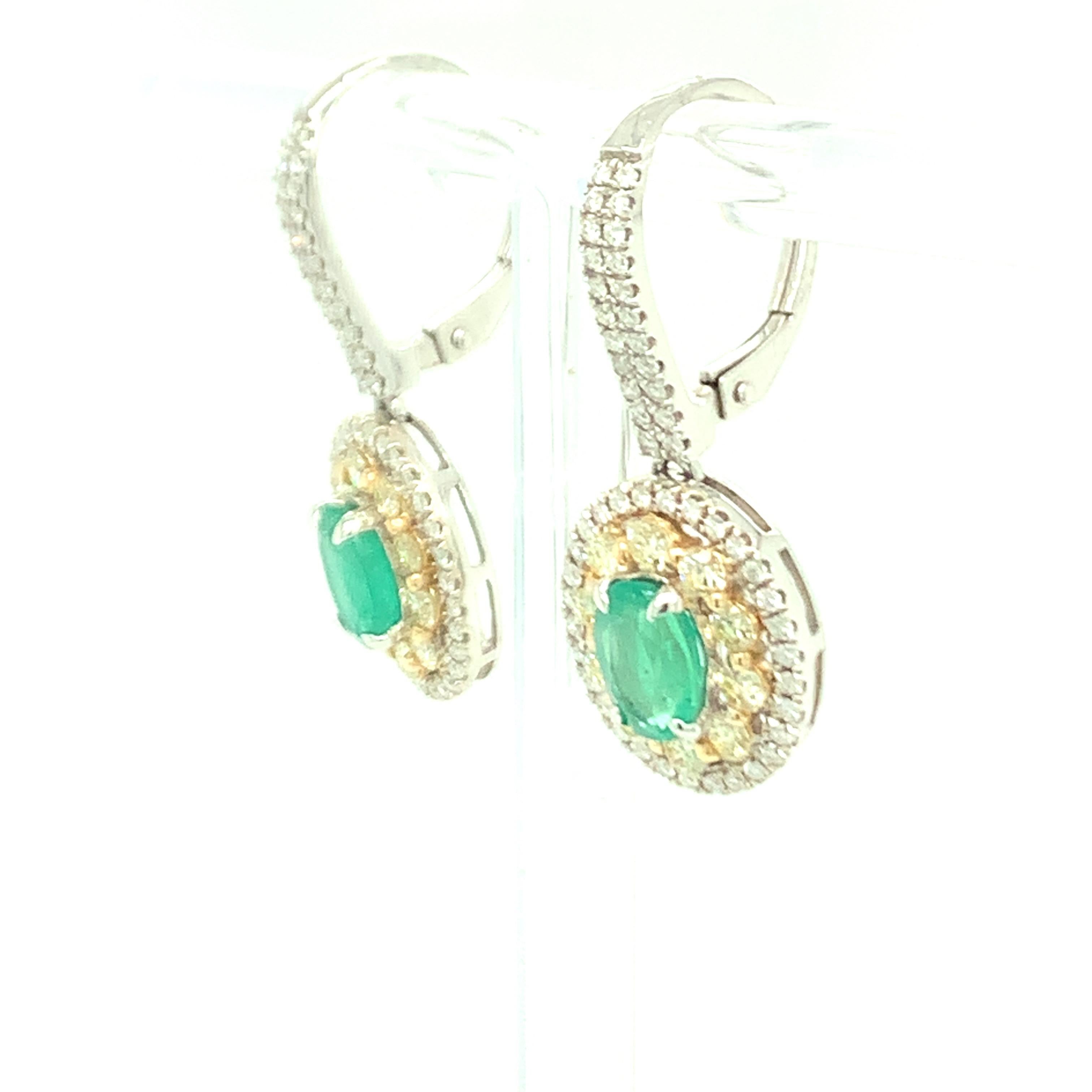 Oval Cut 1.5 Carat Emerald Earrings with Yellow and White Diamond Set in Two Tone Gold