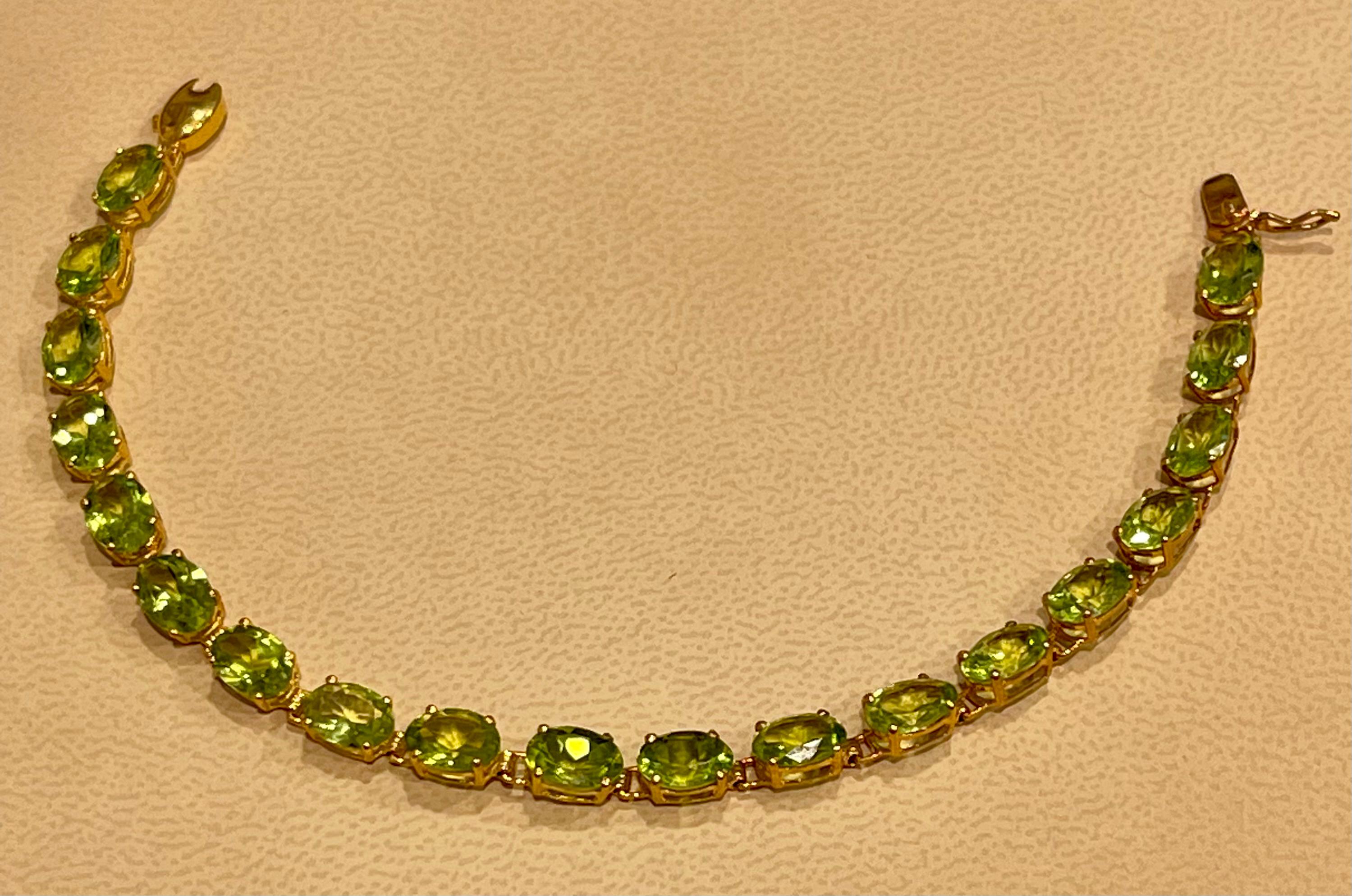 Oval Cut 15 Carat Genuine Natural Pear Shape Peridot Tennis Bracelet 14 Karat Yellow Gold For Sale