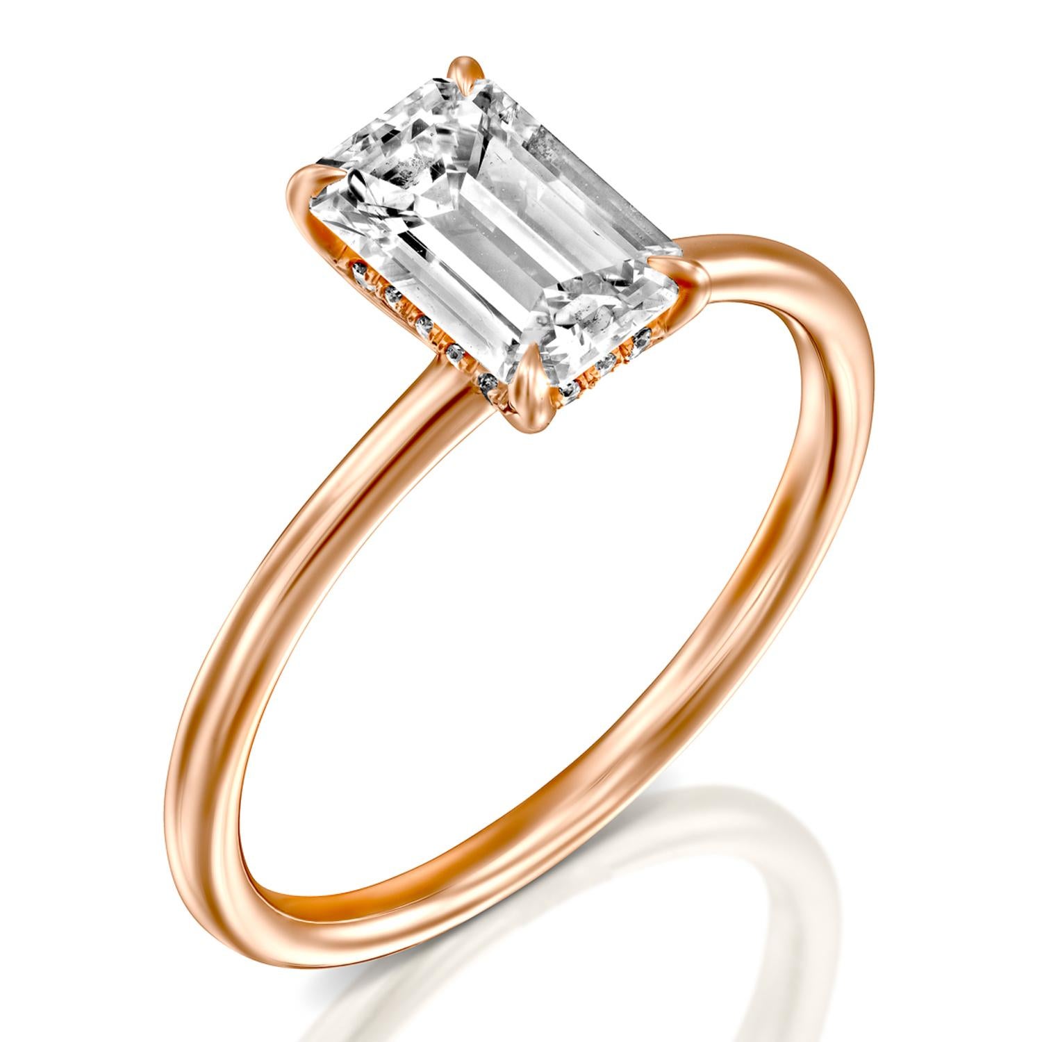 1.5 carat emerald cut diamond on hand
