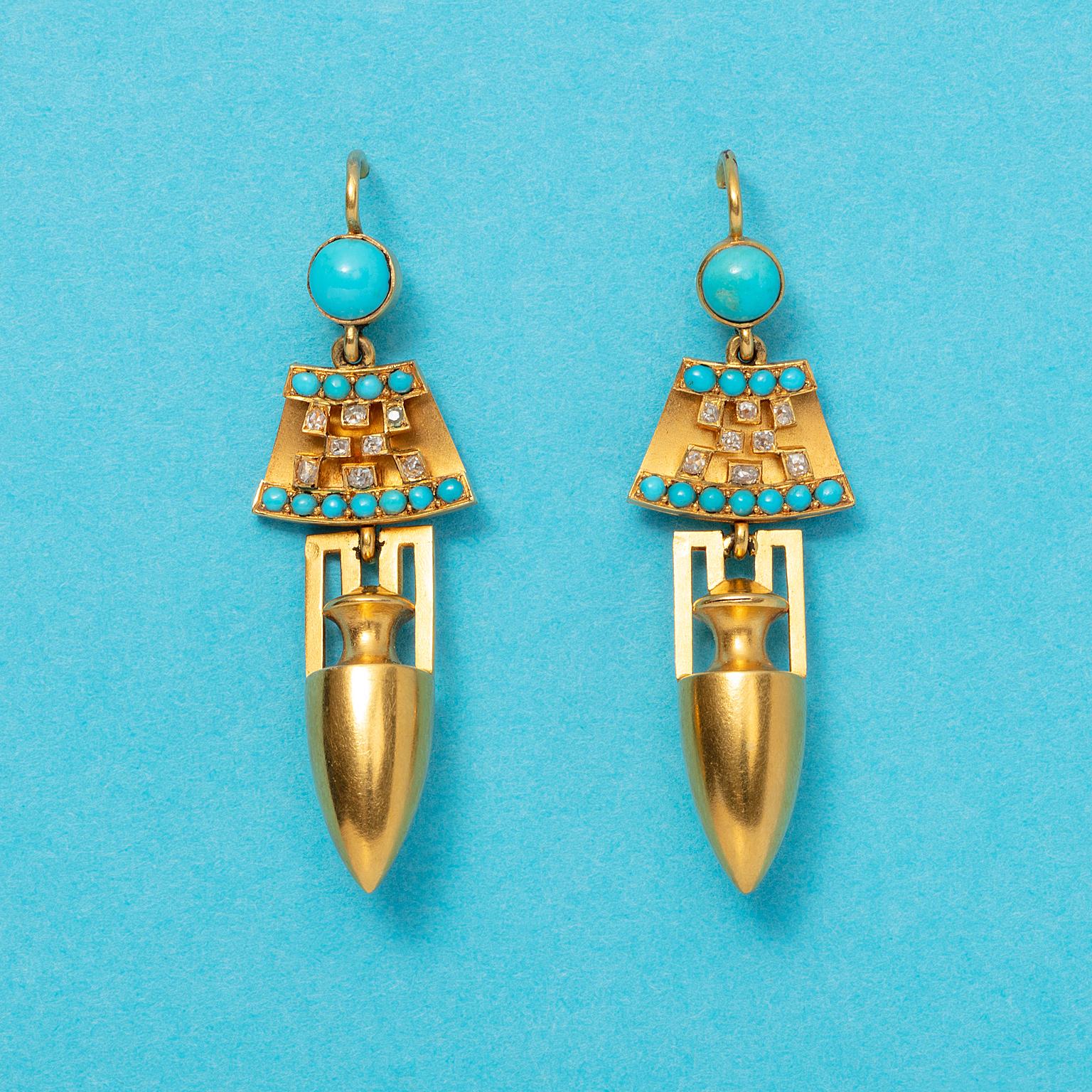A pair of 14 or 15 carat neo-Etruscan yellow gold three-dimensional earrings set with a bezel set cabochon cut turquoise with underneath a fan shaped element set with small turquoises and diamonds from which suspends a gold amphora, England, circa