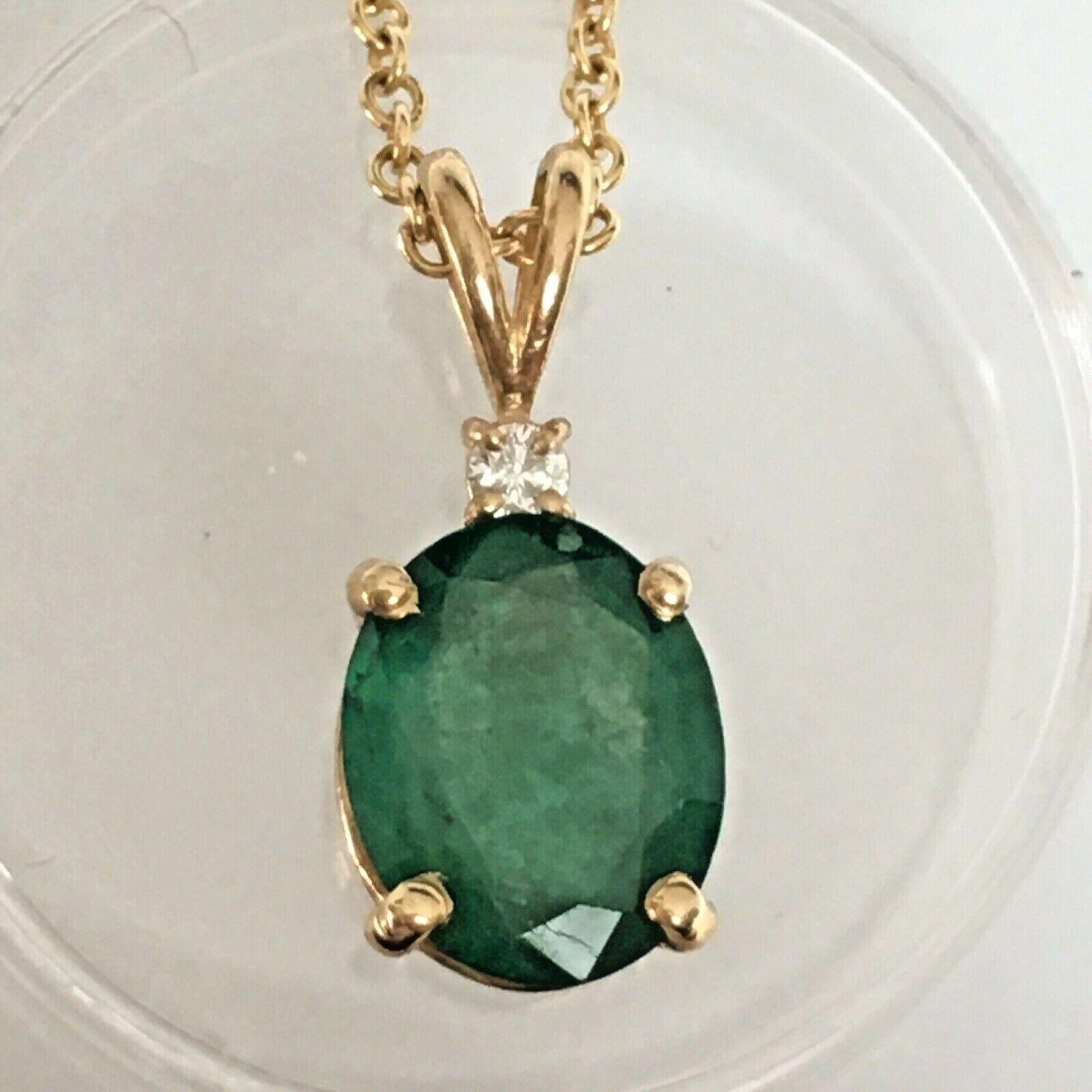 Natural Earth Mind Emerald Diamond Prong Set Pendant Gold 14K
1.5 Carat Oval Cut Emerald, 7.8 mm 9.6 mm by 4 mm
a full cut Diamond of 1.3 mm 
16 inch 14K gold Cable chain
All in good condition, no damage, see pictures 

