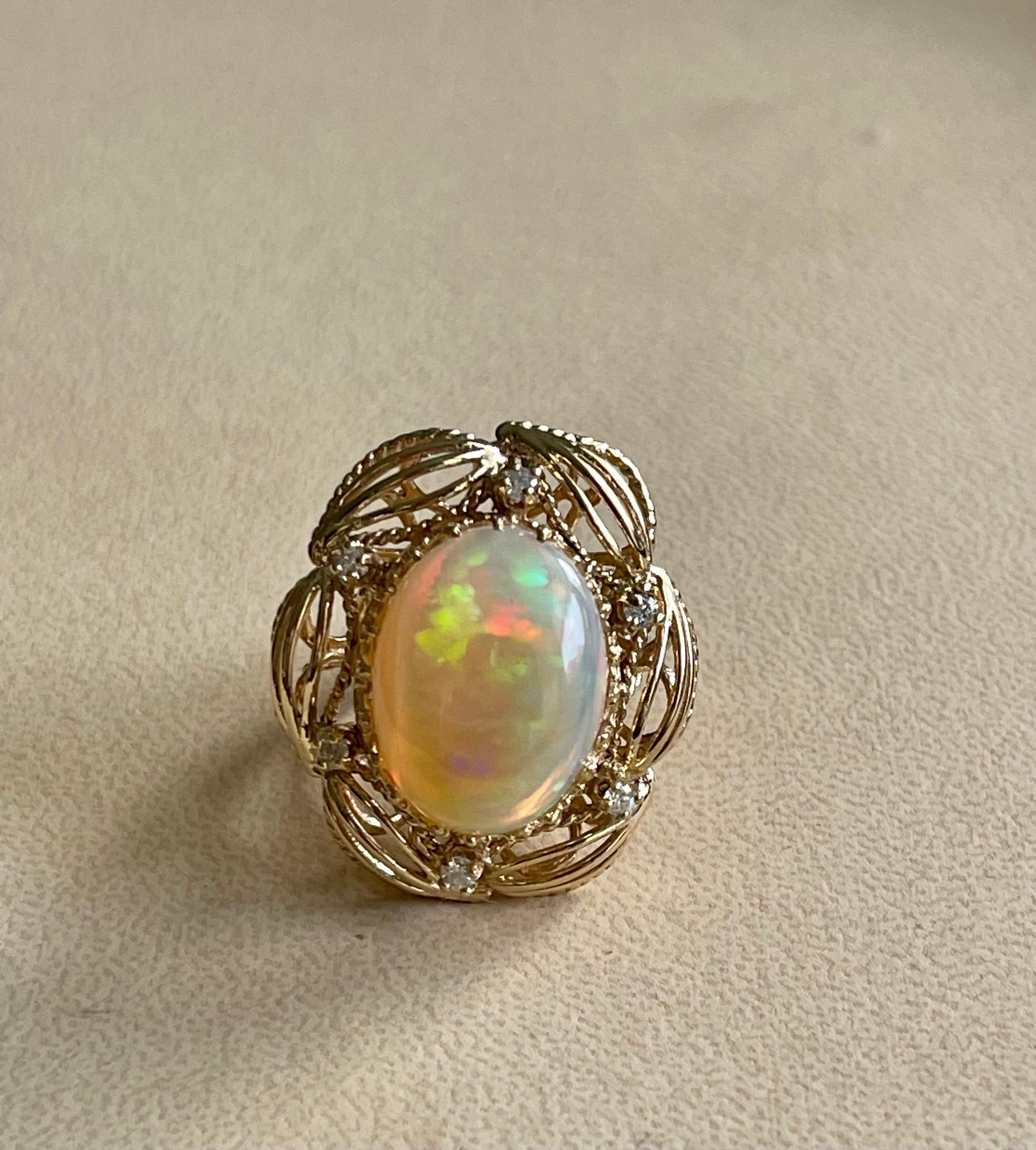 15 Carat Oval Shape Ethiopian Opal Cocktail Ring 14 Karat Yellow Gold Solid Ring For Sale 1