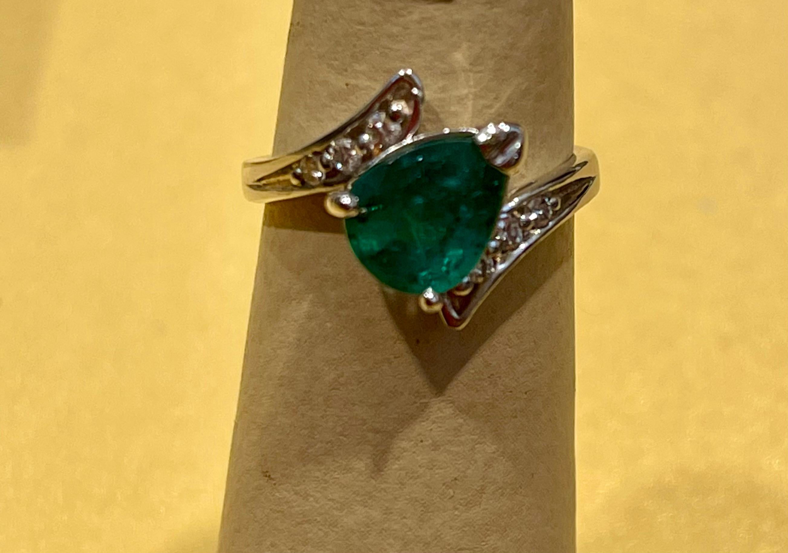 1.5 Carat Pear Cut Emerald and Diamond Ring 14 Karat White Gold 3