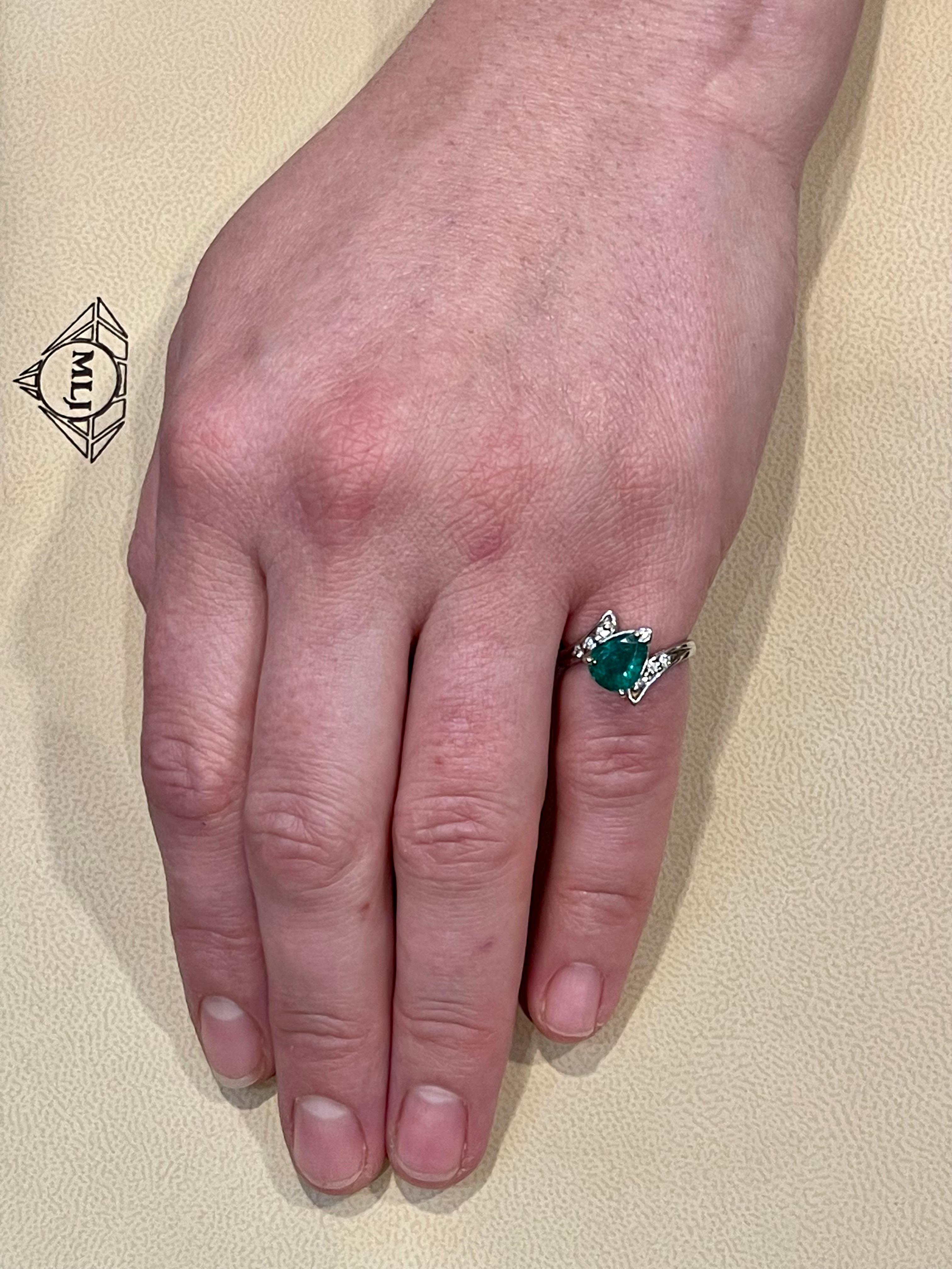 1.5 Carat Pear Cut Emerald and Diamond Ring 14 Karat White Gold 4