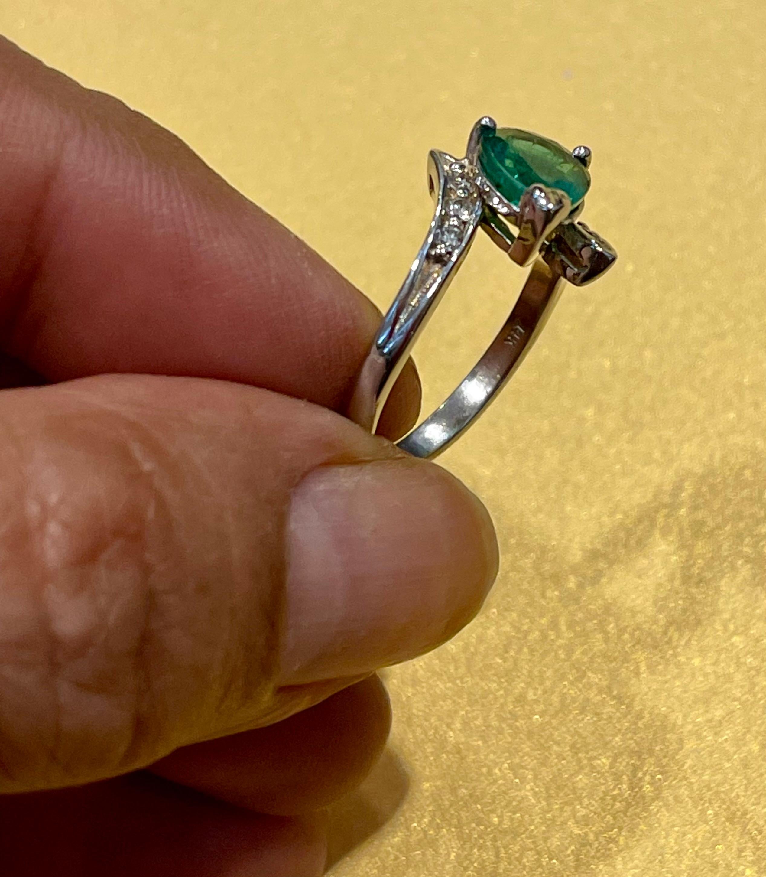 1.5 Carat Pear Cut Emerald and Diamond Ring 14 Karat White Gold 1