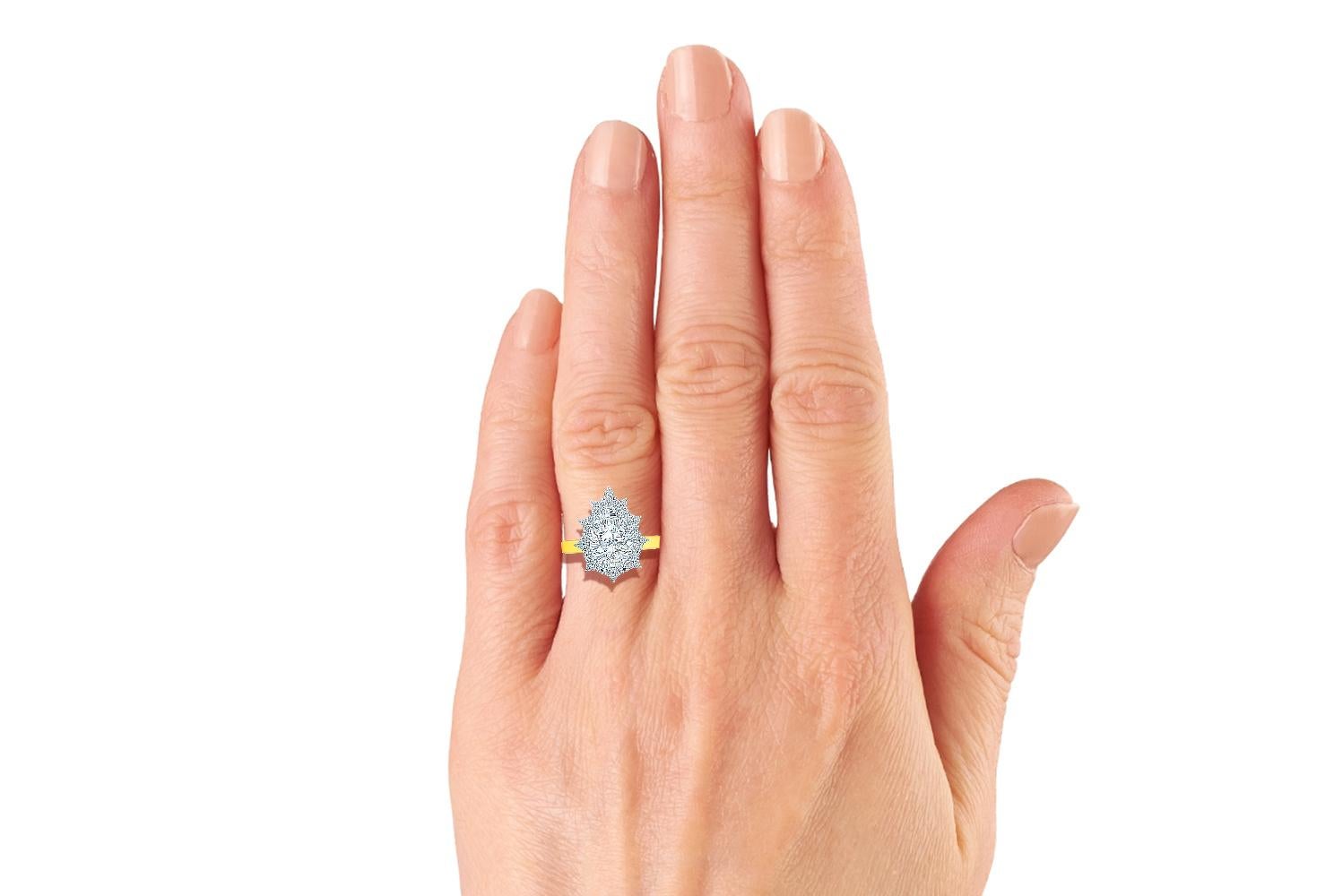 Modern 1.5 Carat Pear Diamond Halo Engagement Ring For Sale