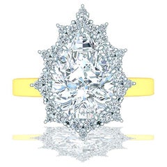 1.5 Carat Pear Diamond Halo Engagement Ring