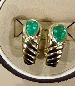 1.5 Carat Pear Shape Emerald Post and Omega Back Earrings 18 Karat Yellow Gold