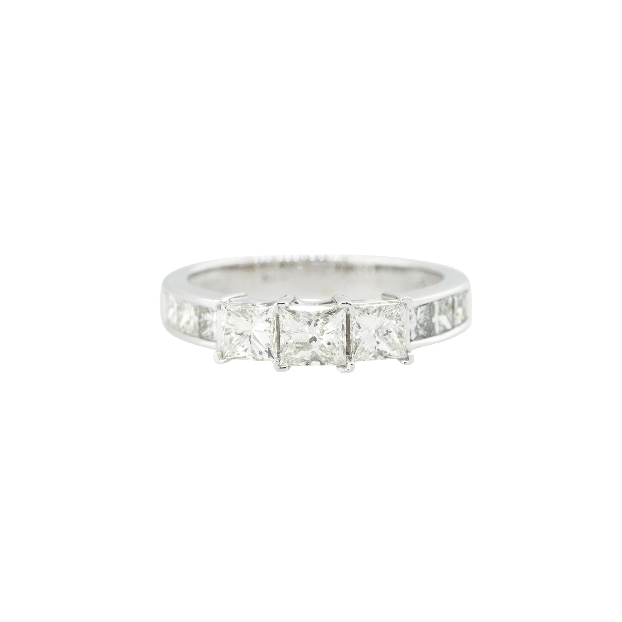 18k White Gold 1.5ctw Princess Cut Diamond Engagement Ring
Style: Women's Diamond Engagement Ring
Material: 18k White Gold
Diamond Details: The 3 larger stones are Princess cut diamonds and there are 6 smaller Princess cut diamonds along the band.
