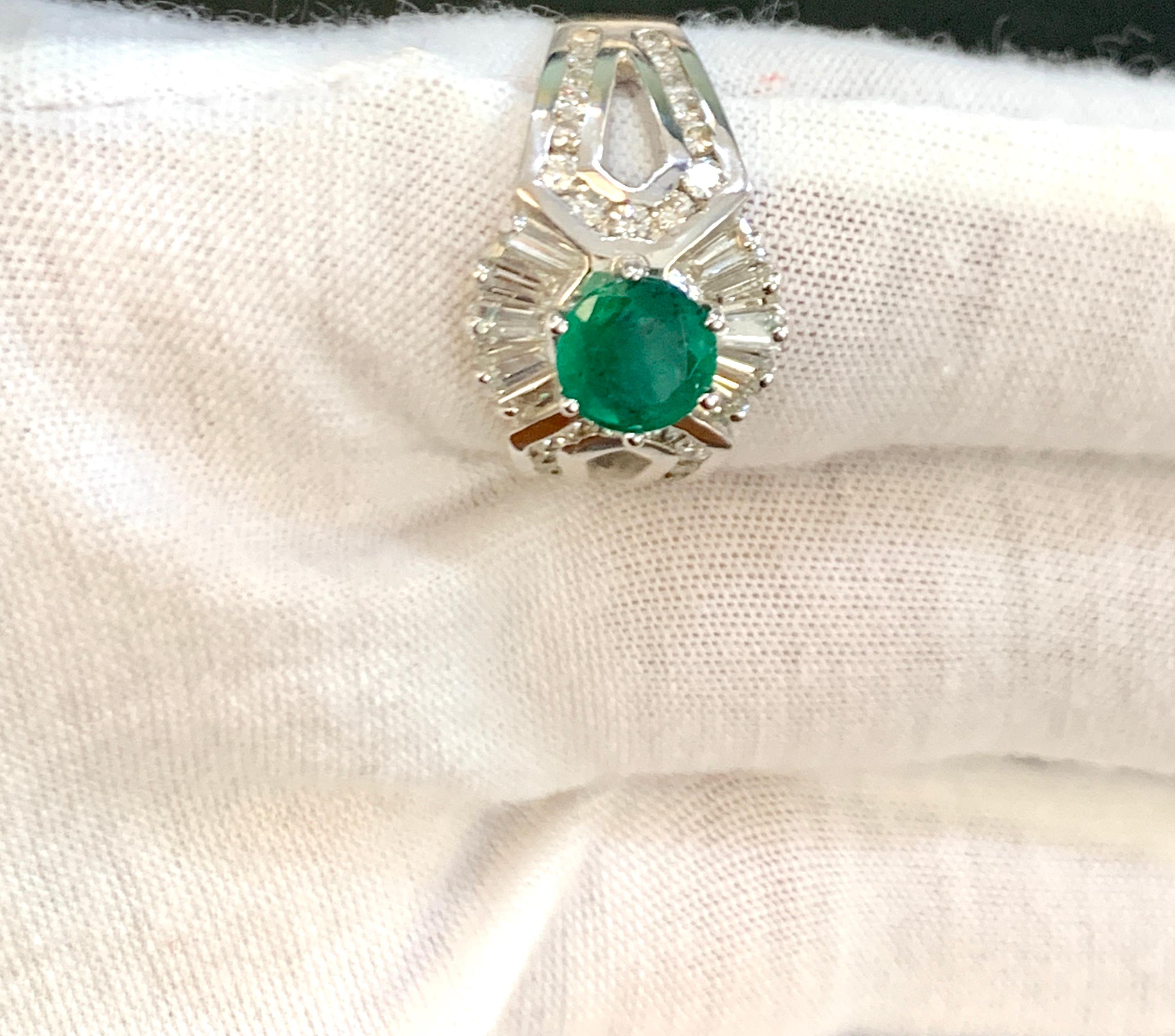 Women's 1.5 Carat Round Cut Emerald and 1.2 Carat Diamond Ring 18 Karat White Gold For Sale