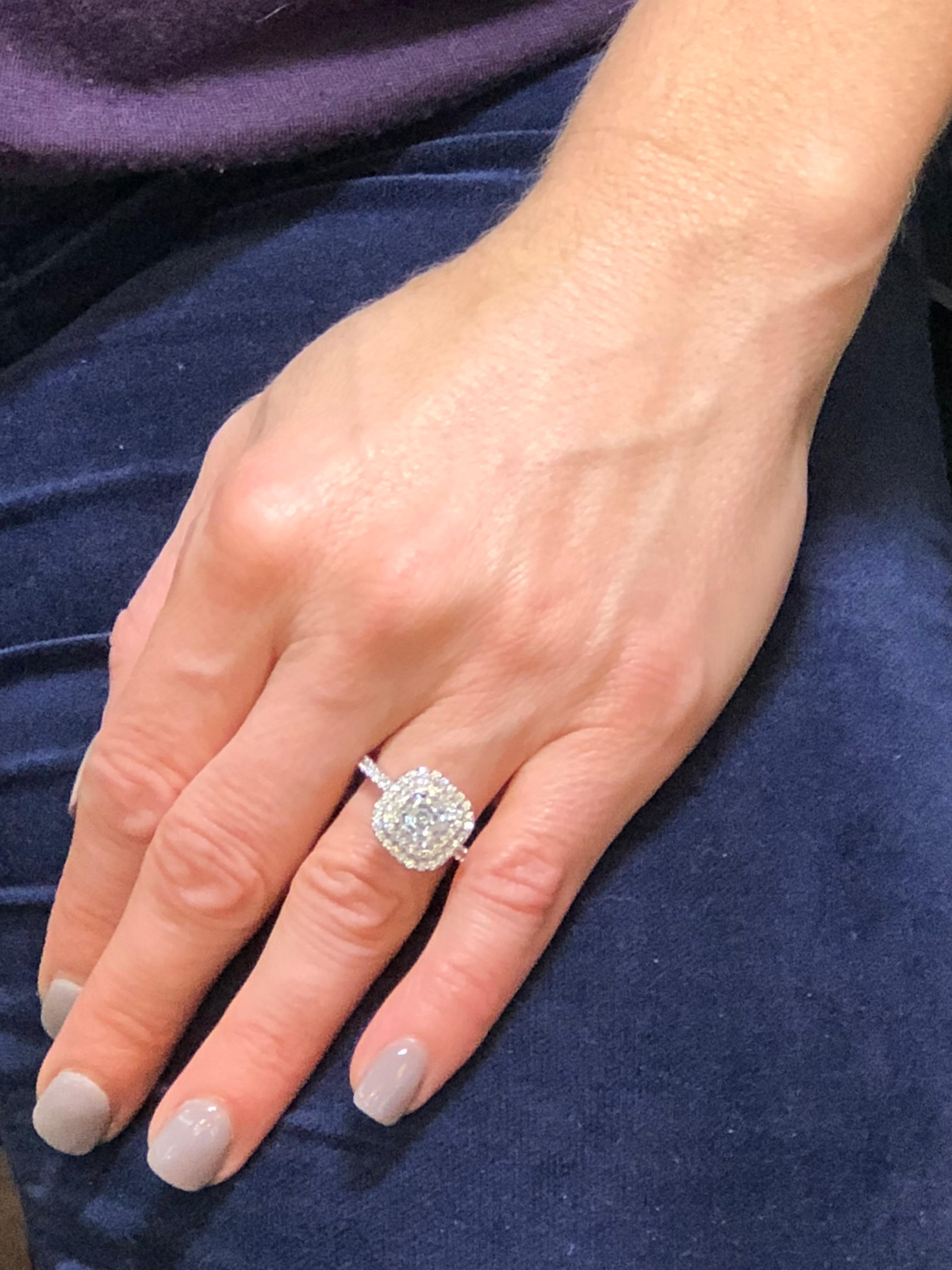 1.5 carat emerald cut diamond ring