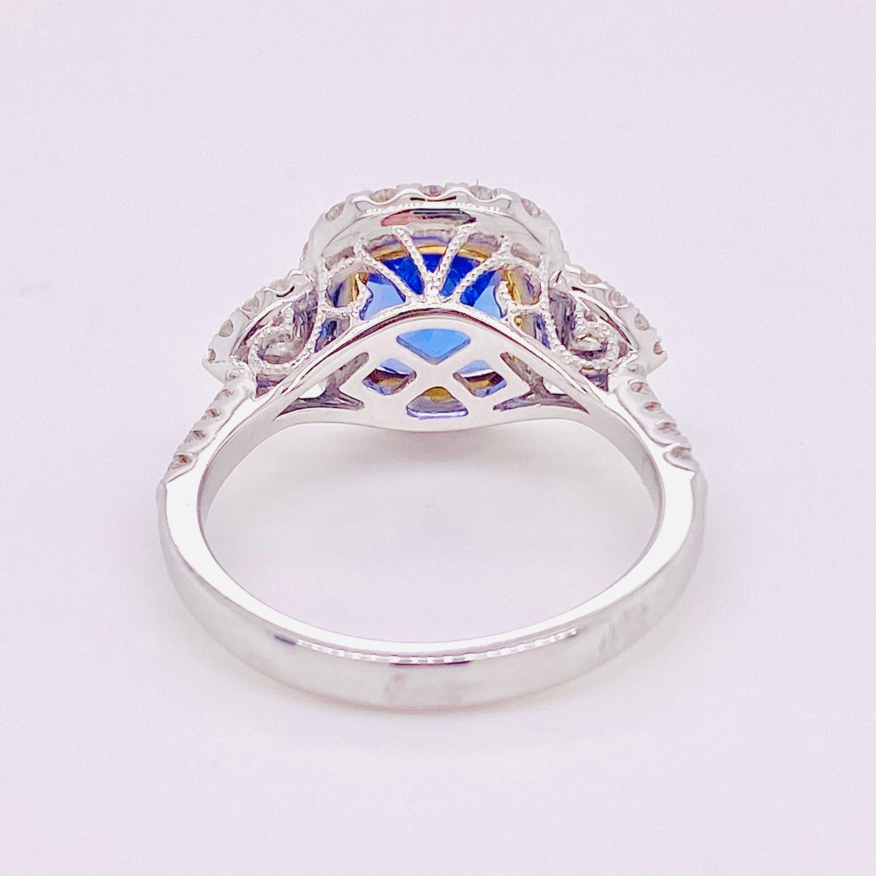 For Sale:  1.5 Carat Tanzanite Halo Ring, .50 Carat Diamond and Tanzanite Halo Ring 4