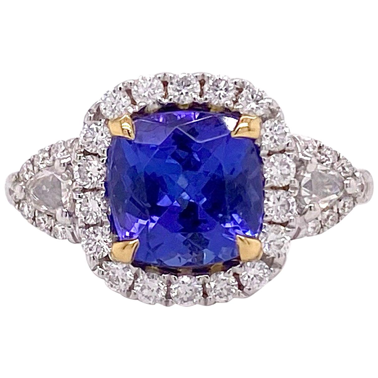 1.5 Carat Tanzanite Halo Ring, .50 Carat Diamond and Tanzanite Halo Ring