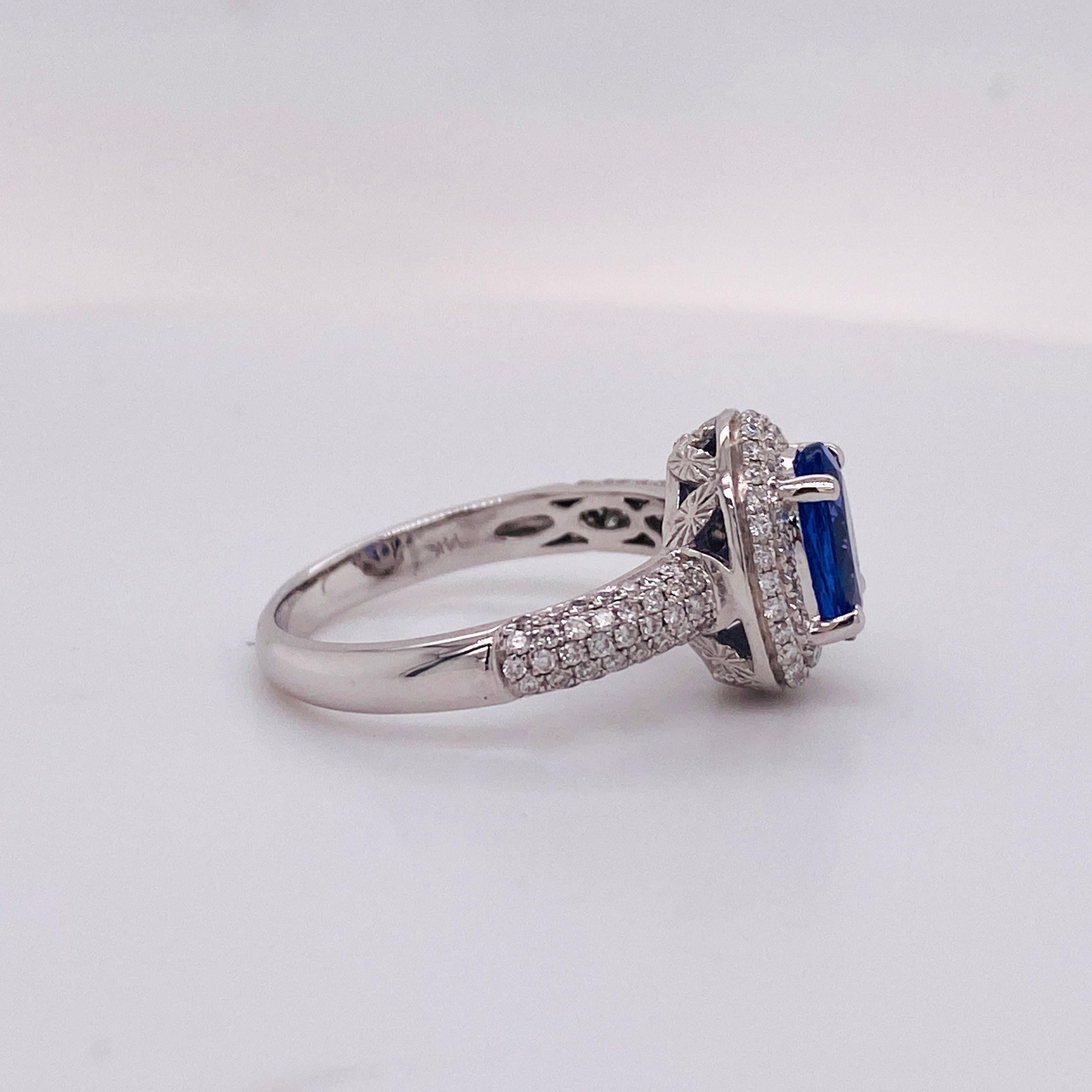 Modern 1.5 Carat Tanzanite Ring, 14 Karat White Gold Ring, .50 Carat Diamond Ring Halo For Sale