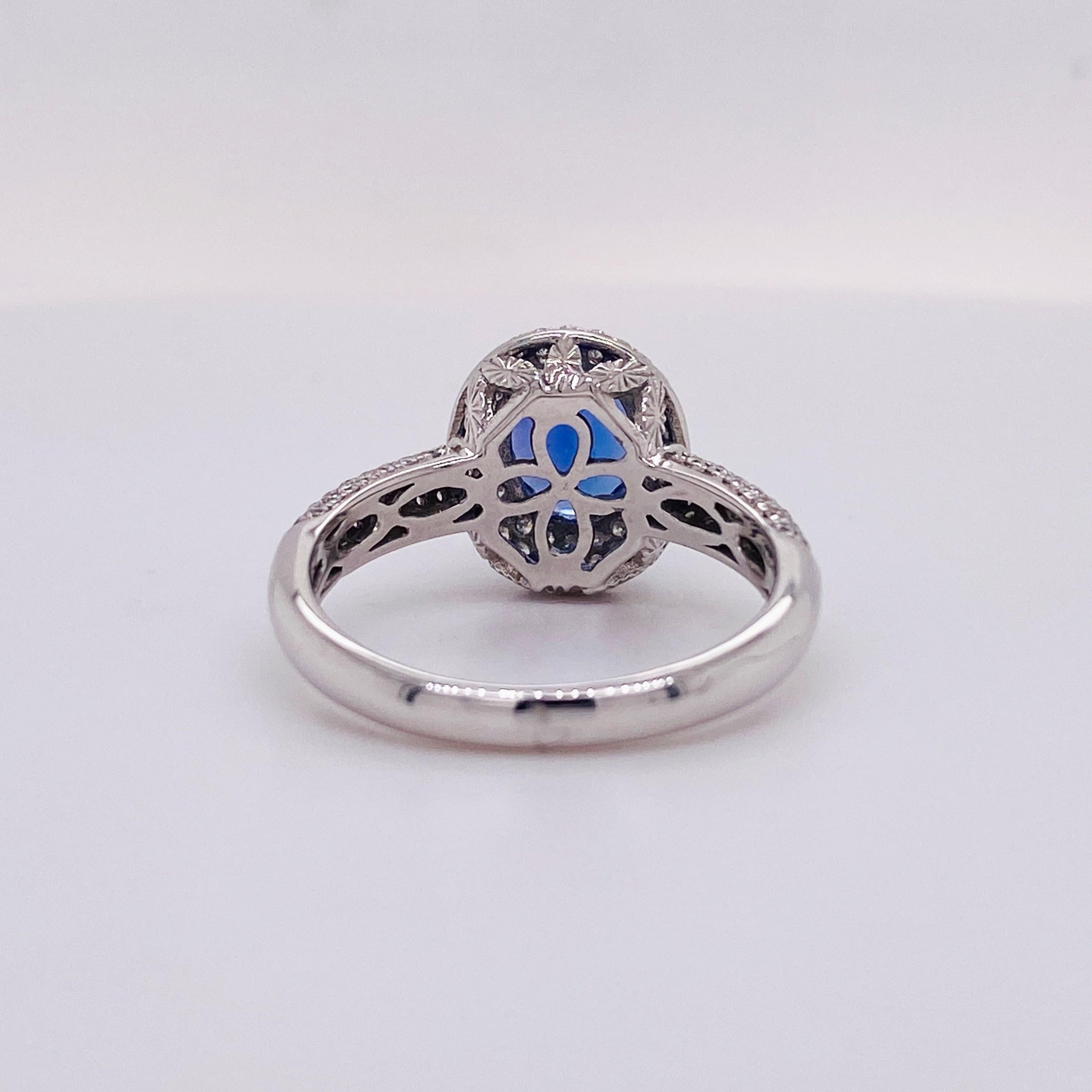 Oval Cut 1.5 Carat Tanzanite Ring, 14 Karat White Gold Ring, .50 Carat Diamond Ring Halo For Sale