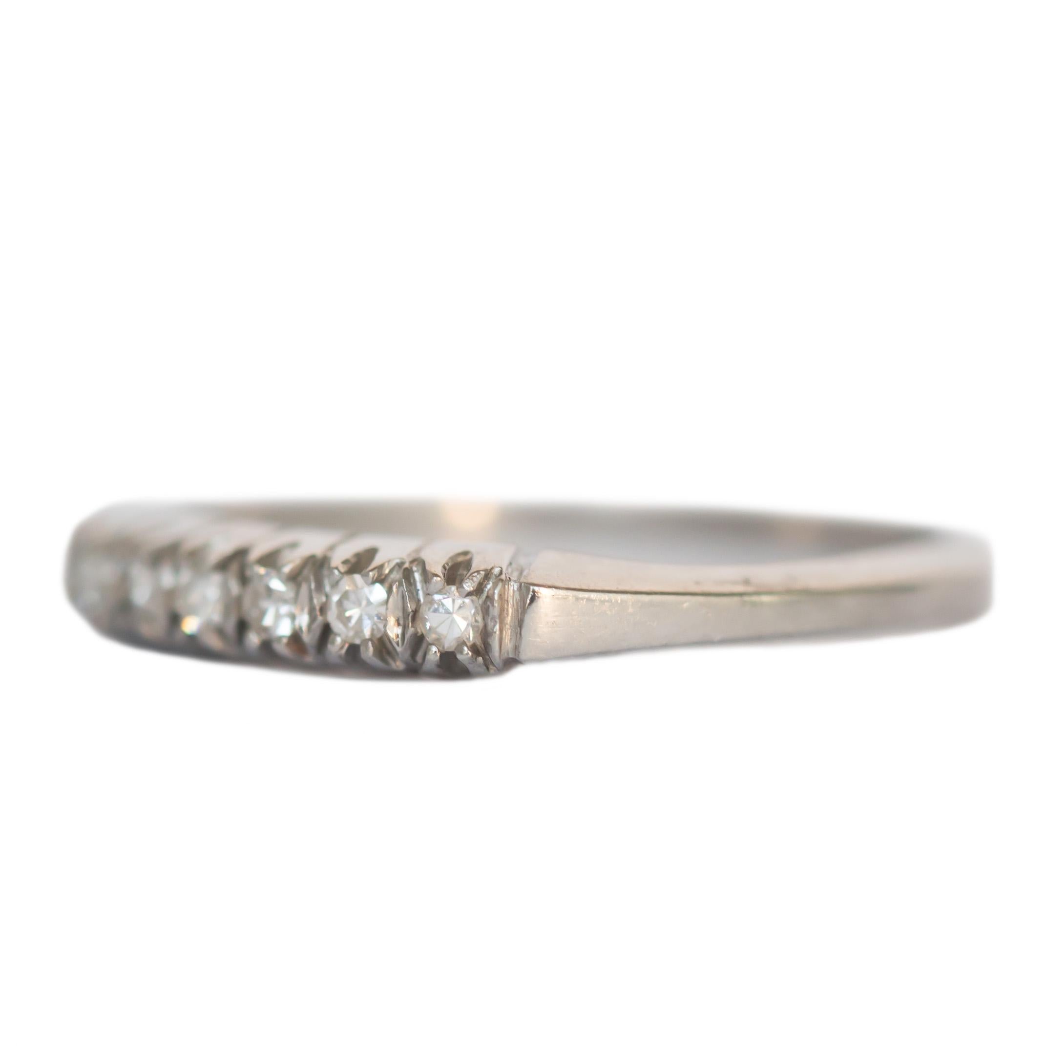 Item Details: 
Ring Size: 5.75
Metal Type: Platinum [Hallmark and Tested]
Weight: 2.5 grams

Side Stone Details: 
Shape: Old Single Cut
Total Carat Weight: .15 carat, total weight
Color: G
Clarity: VS

Finger to Top of Stone Measurement: 2.2