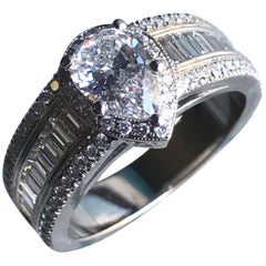 1.5 Carat TW Approximate Pear Shape Halo Diamond Ring, 14 Karat White Ben Dannie