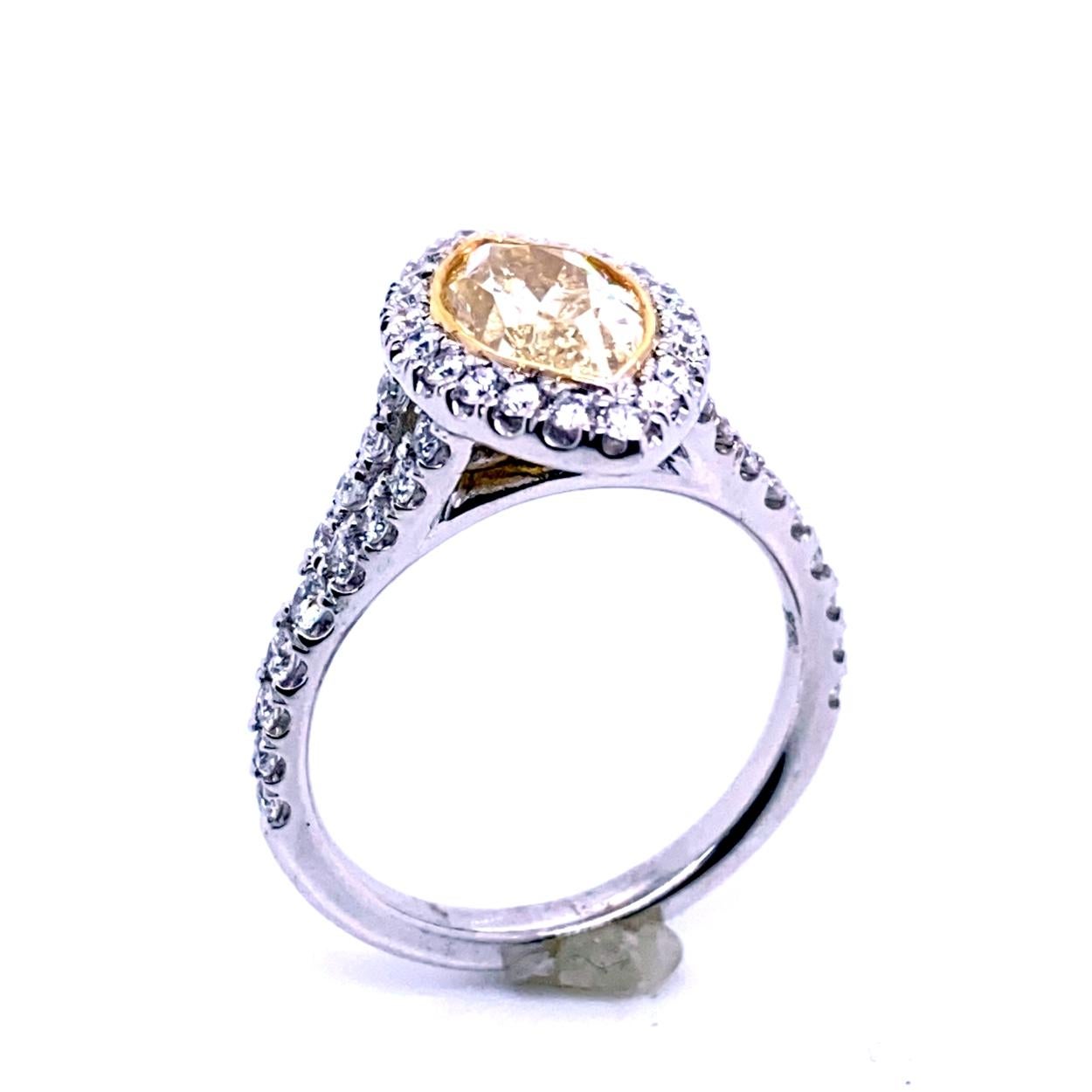 Contemporary 1.5 Carat Yellow MQ Diamond in Pave Set 18 Karat Split Shank Ring with Halo For Sale