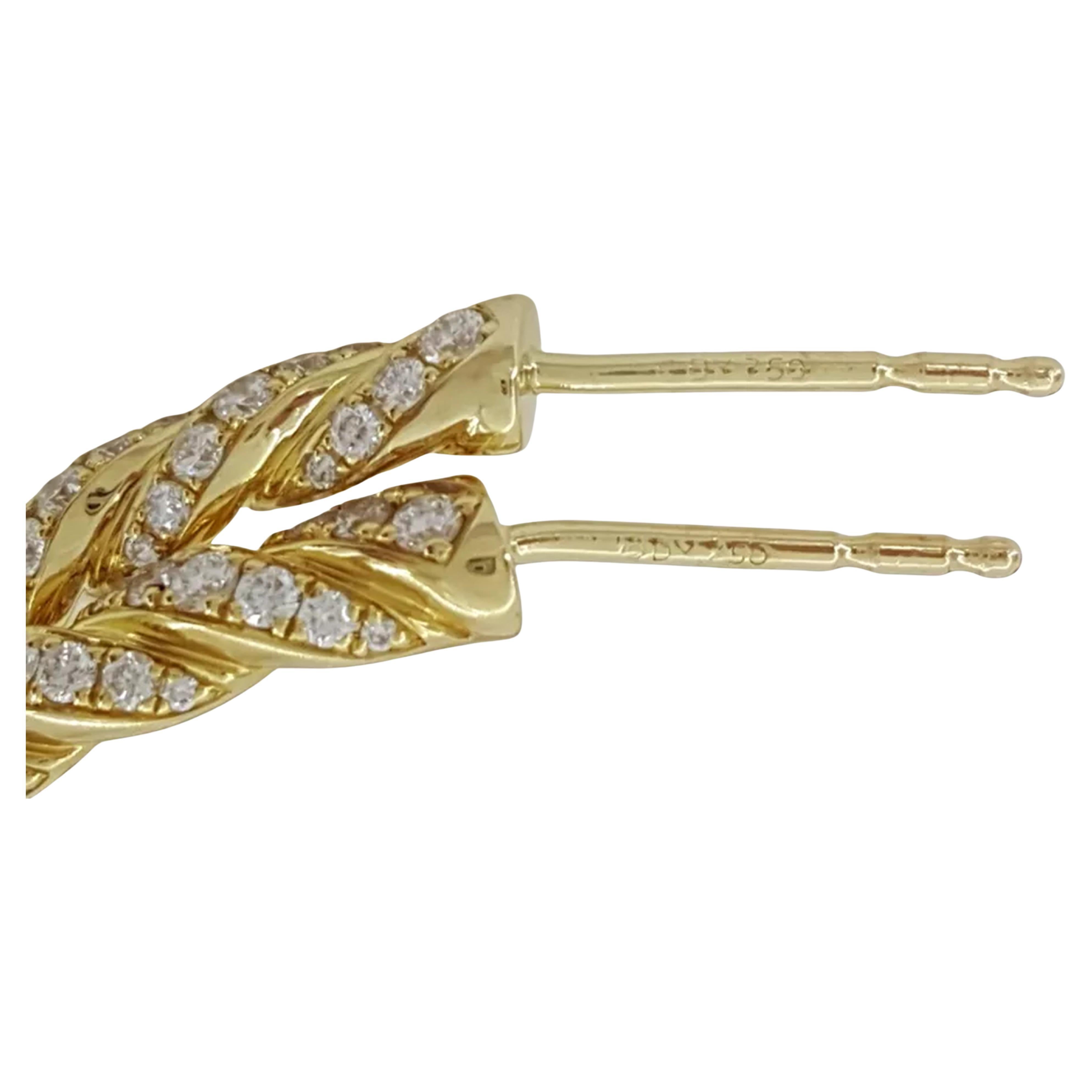 1.5 ct David Yurman Sculpted Cable Flex Round Diamond Hoop Earrings crafted in 18K Yellow Gold.

These earrings weigh 15 grams and measure 39 mm in length and 3.7 mm in width. They feature a total of 266 Natural Round Brilliant Cut Diamonds,